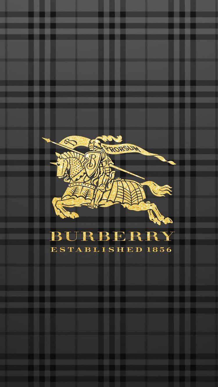 Burberry 桌布 壁紙 — 金色 Burberry 騎士標誌，深灰色格子背景，下方有品牌文字。