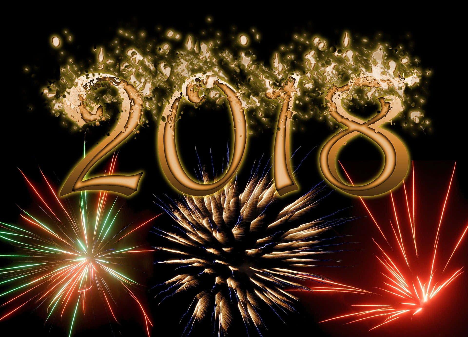 2018 桌布 壁紙 — 金色2018數字在黑色夜空中綻放閃爍的煙火。