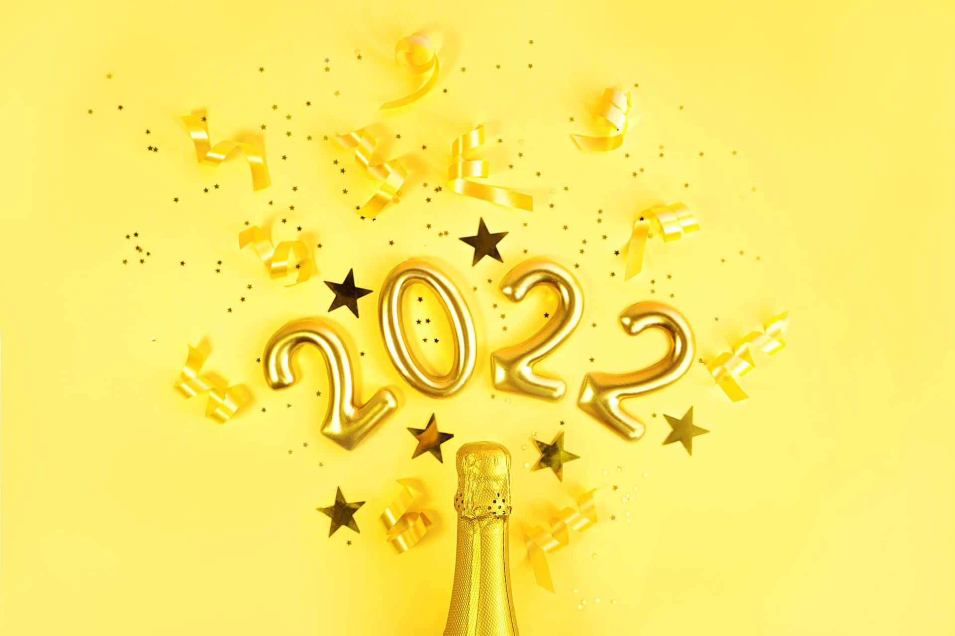 金色2022氣球和五彩紙屑用香檳瓶慶祝新年。 — 星星動圖 壁紙