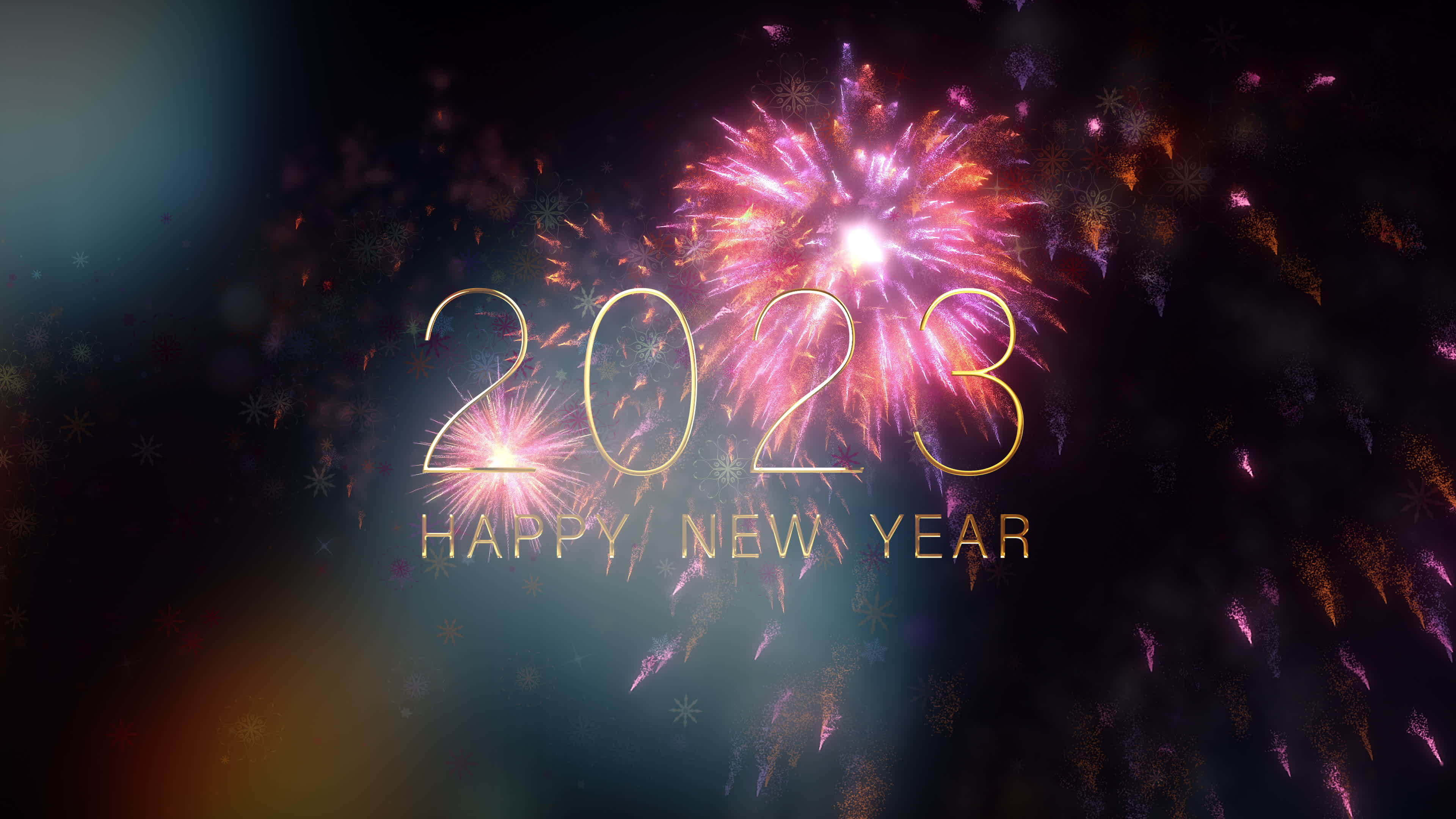 Fireworks 桌布 壁紙 — 金色2023字樣在黑暗天空中綻放的鮮豔煙火和飄落的雪花下閃耀。