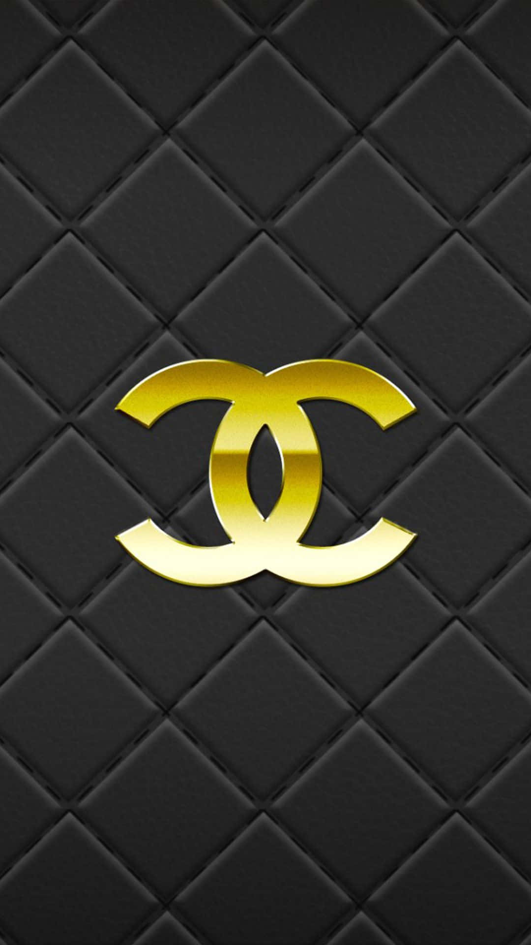 黑金動畫 桌布 壁紙 — 金色Chanel標誌在帶有紋理的黑色菱格紋背景上閃耀，呈現出時尚奢華的壁紙。