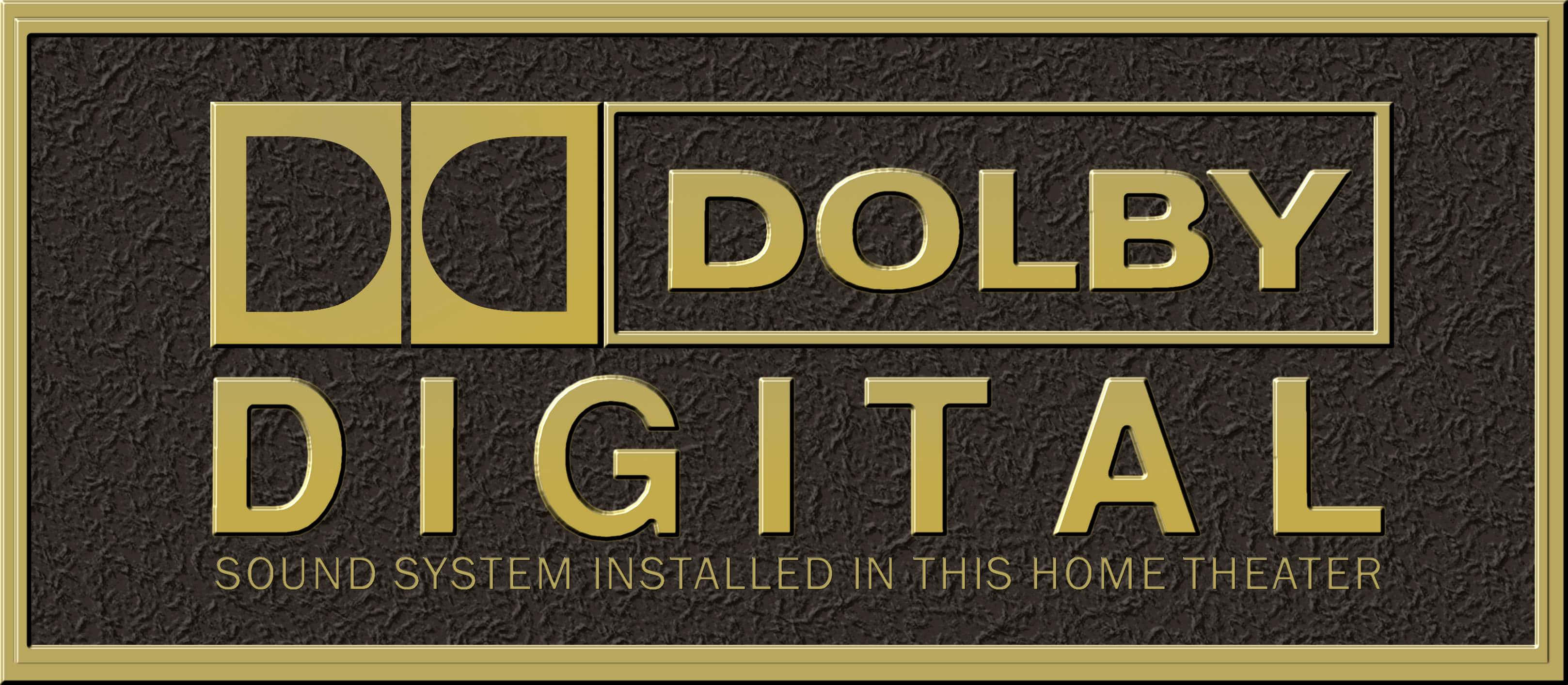 Dolby Digital 桌布 壁紙 — 金色Dolby Digital標誌牌，置於有紋理的深色背景上，帶有浮雕文字，指示家庭劇院安裝。