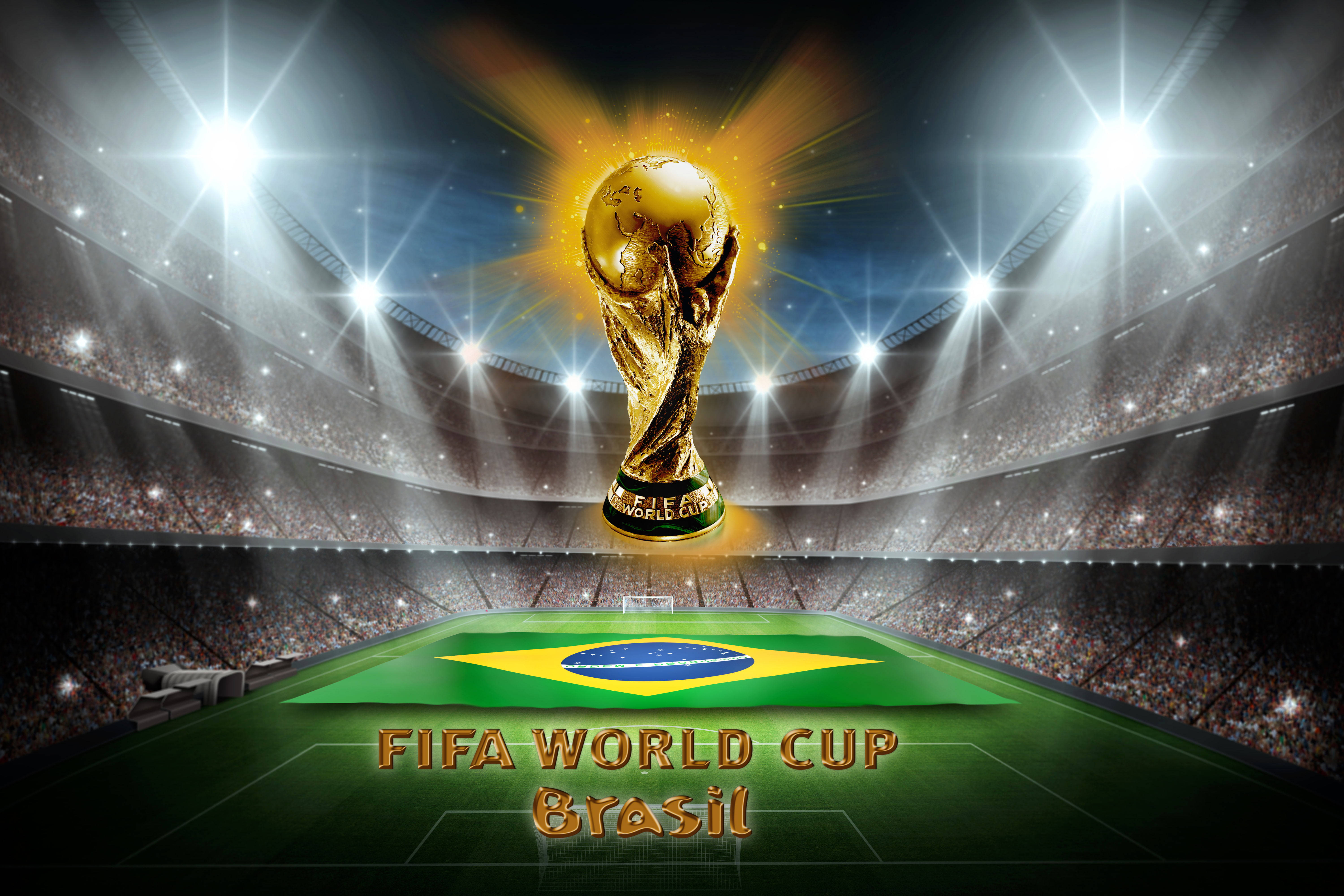 巴西 桌布 壁紙 — 金色FIFA世界盃獎盃在明亮的泛光燈下，在擠滿觀眾的球場中的巴西國旗場地上閃耀。
