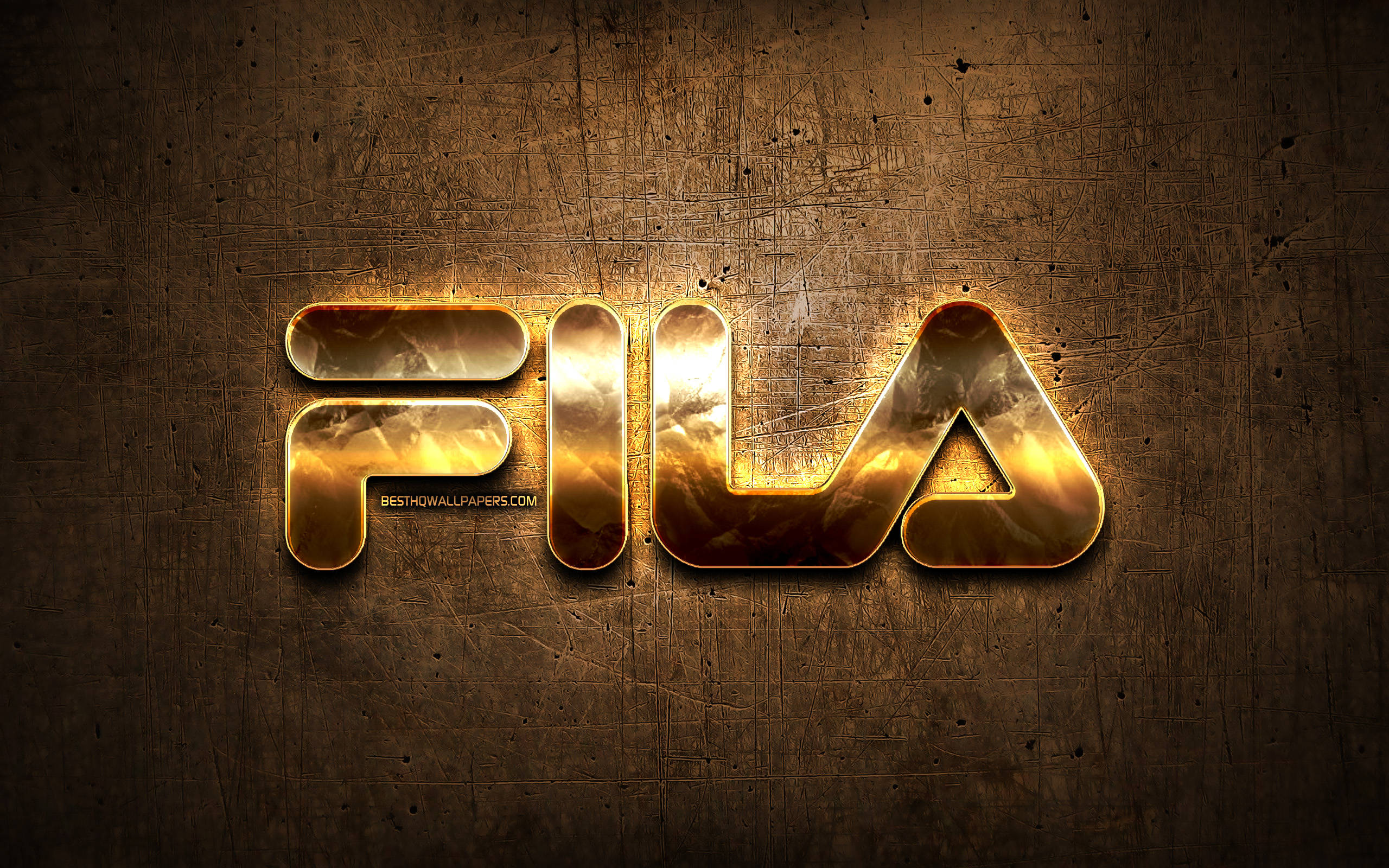 Fila 桌布 壁紙 — 金色Fila標誌帶有陰天雲紋理，在刮花的金屬棕色背景上發光。