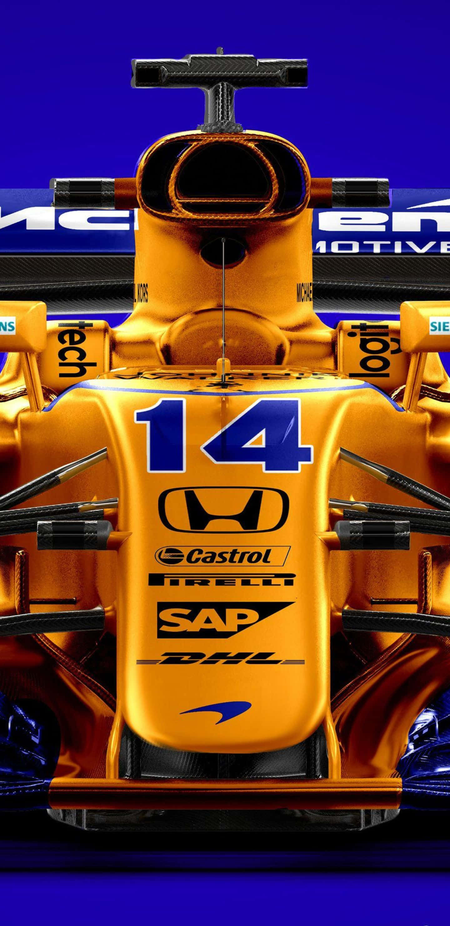 Formula 1 桌布 壁紙 — 金色一級方程式賽車近距離特寫，車身有14號及贊助商標誌，背景為深藍色。