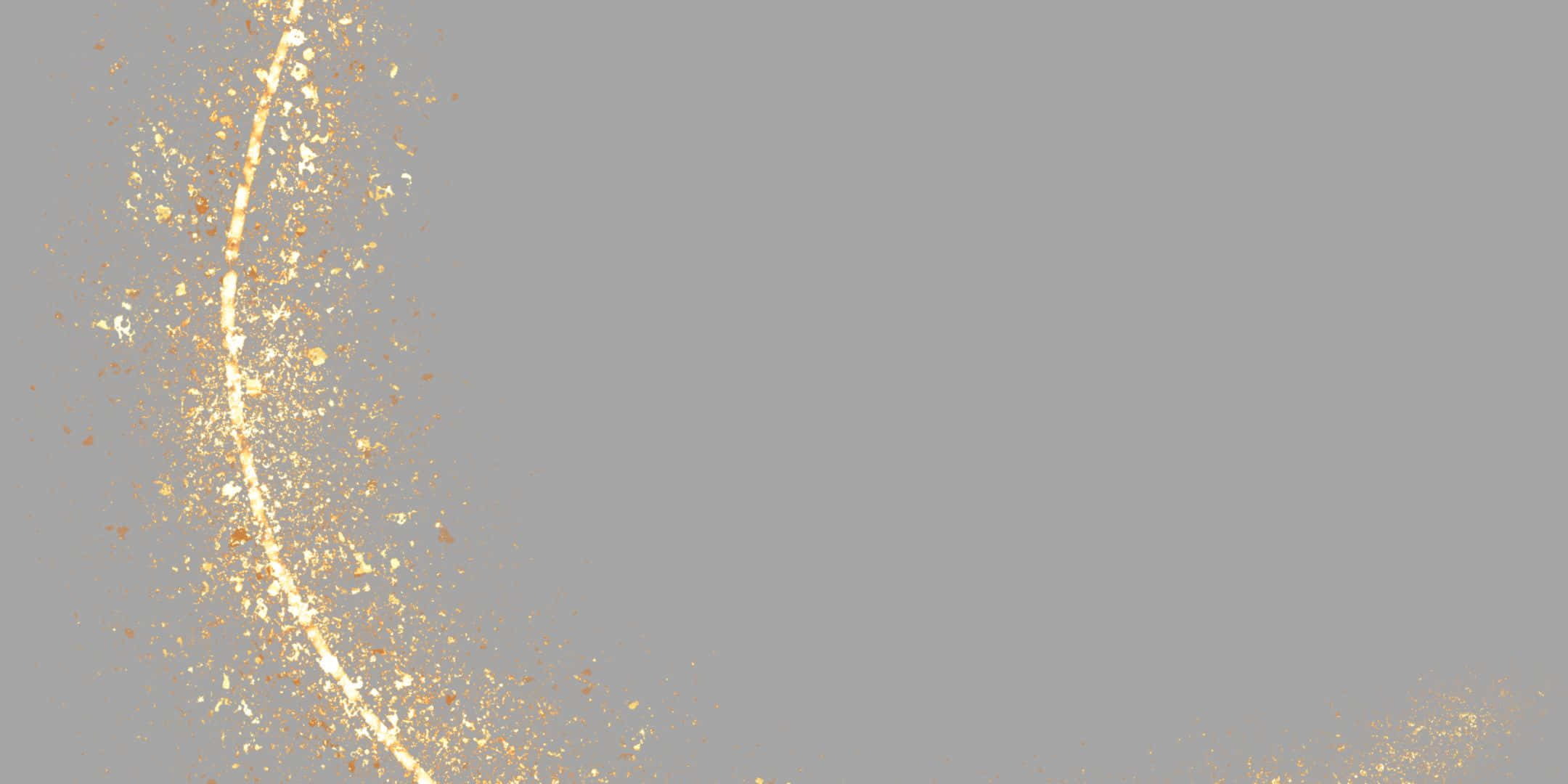Shimmer 桌布 壁紙 — 金色亮粉粒子在柔和的灰色背景上形成彎曲軌跡旋轉。