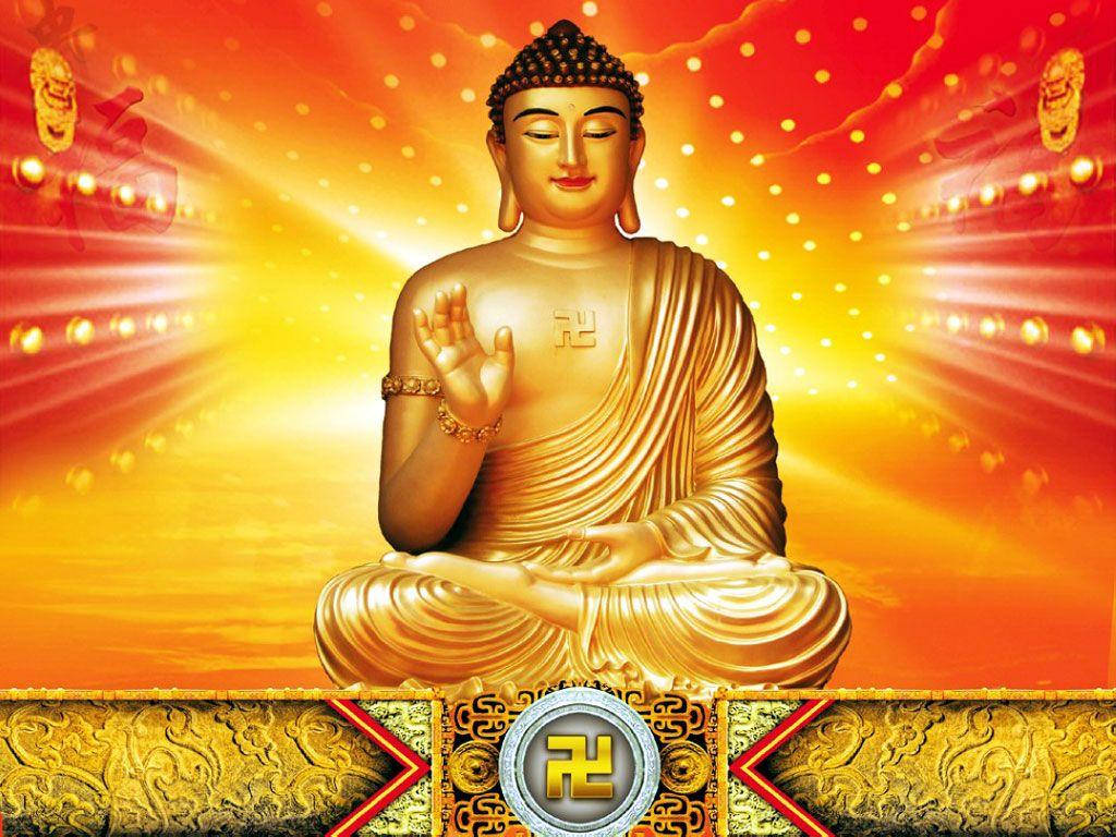 god laptop 桌布 壁紙 — 金色佛像在熾熱的橙黃色天空背景下散發出寧靜的光芒，下方有華麗的圖案。
