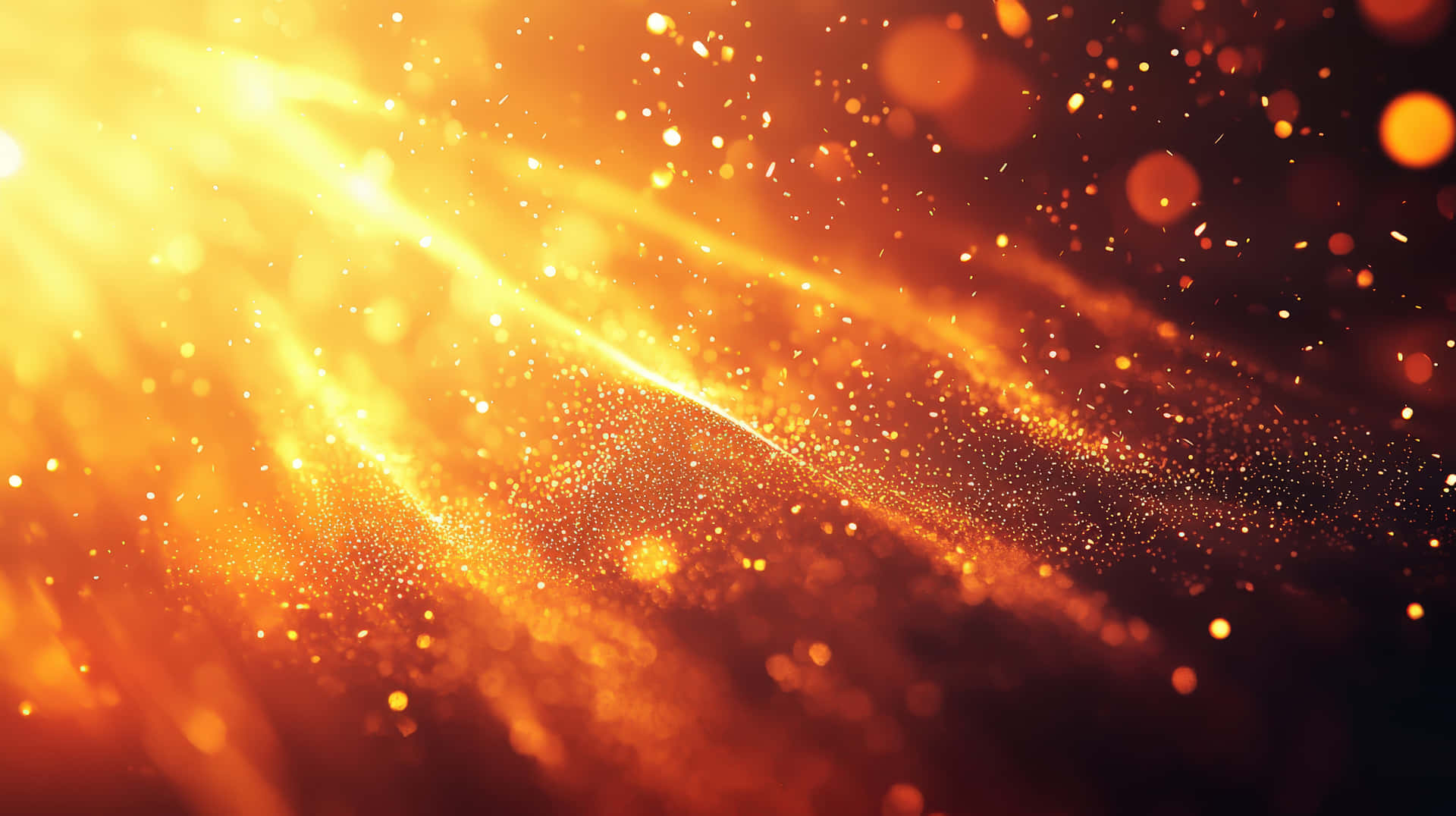 Golden bokeh lights create a warm, abstract background. 壁紙 — 金色光線穿過發光粒子場，背景為黑暗。