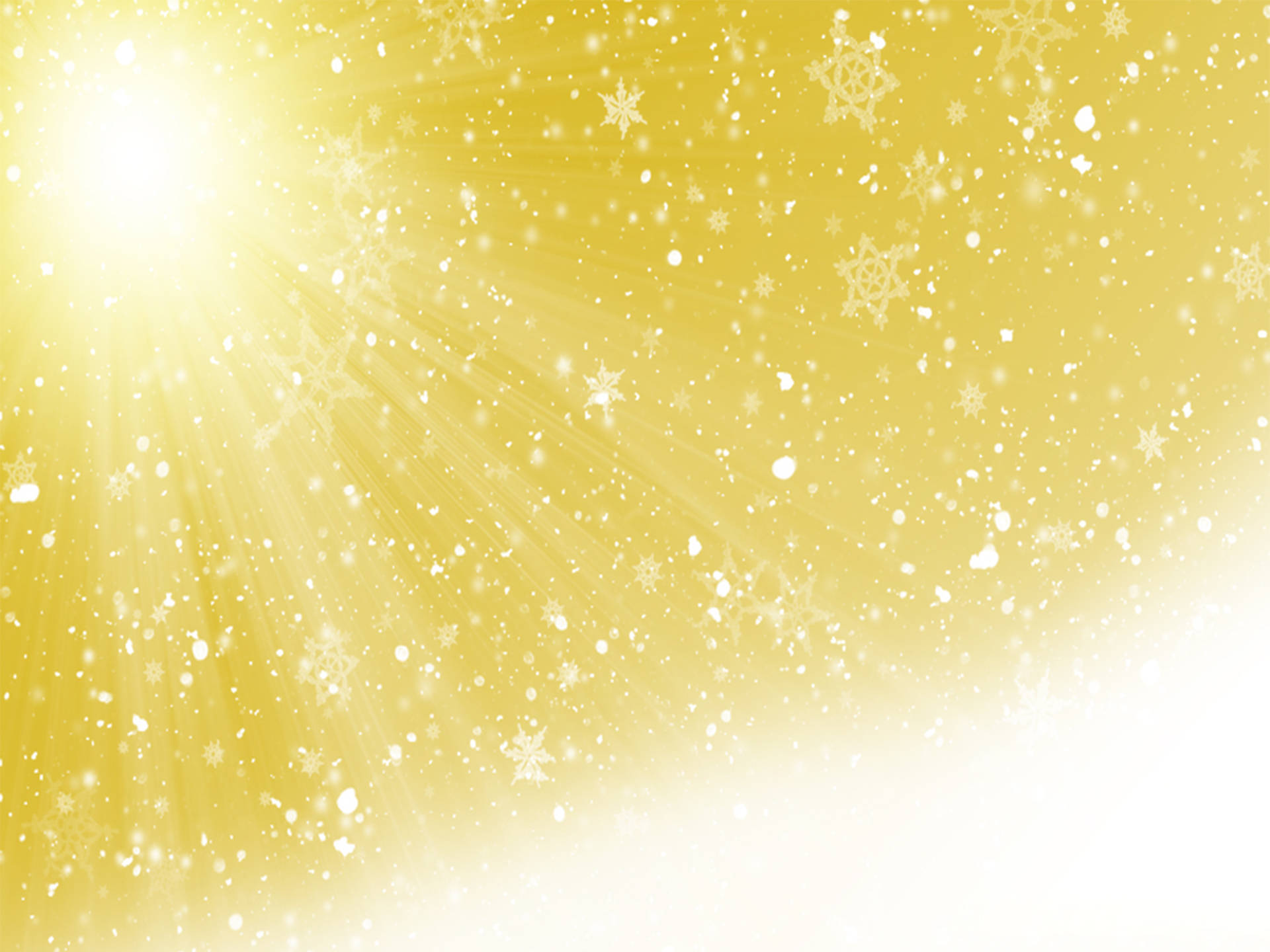 柔和黃色 桌布 壁紙 — 金色光芒從左側迸發，細膩的雪花在溫暖發光的天空中飄舞。