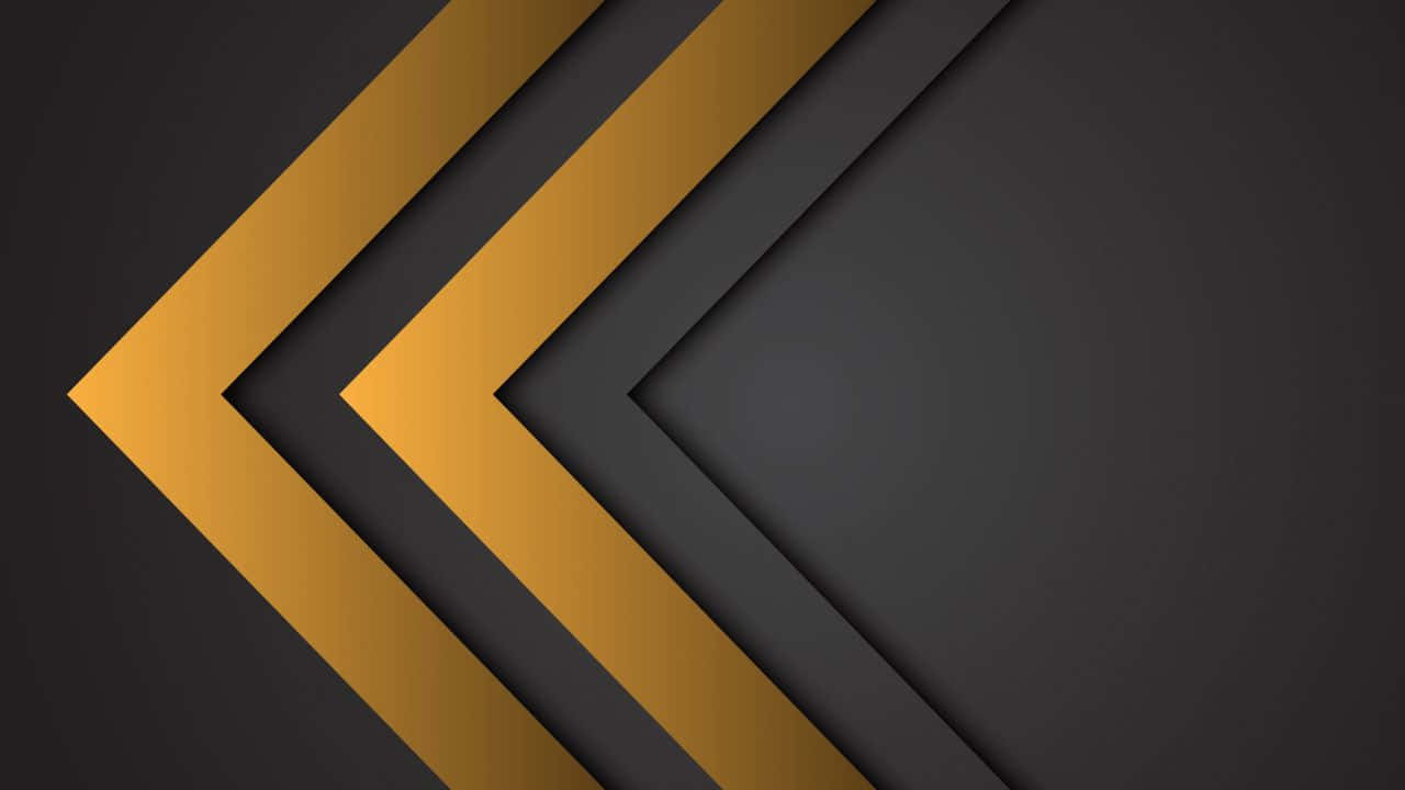 High Resolution Black And Gold 桌布 壁紙 — 金色和炭灰色的幾何大膽人字形圖案，營造出現代分層抽象構圖。