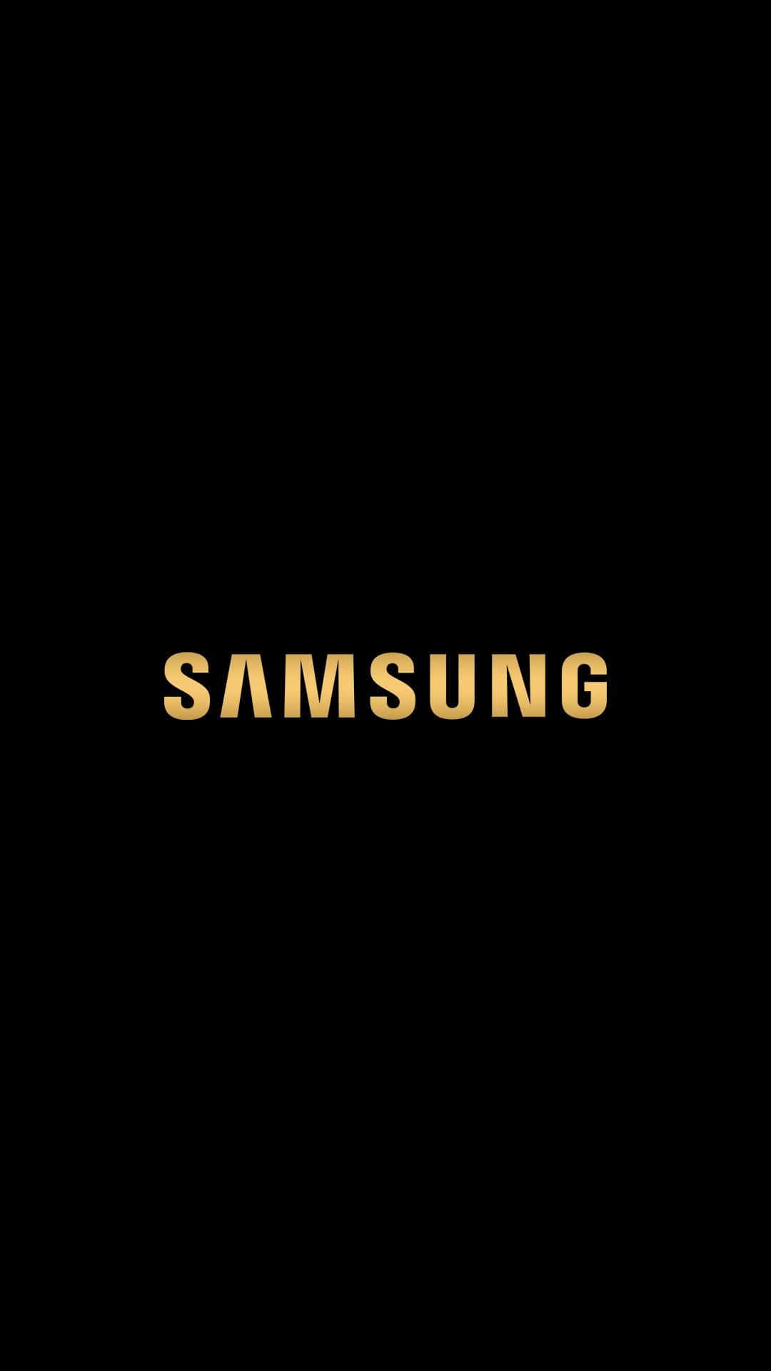 三星 桌布 壁紙 — 金色字母拼寫的 samsung 字樣居中於純黑背景上。