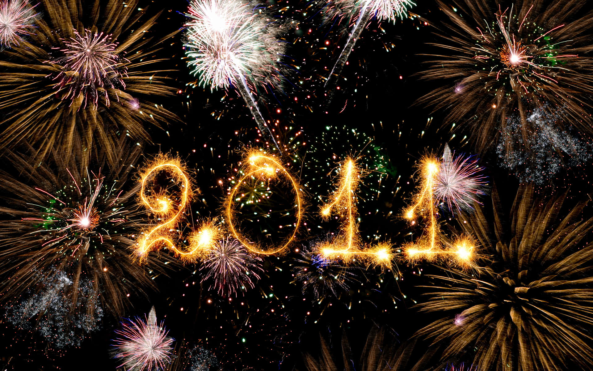 Fireworks 桌布 壁紙 — 金色煙火在佈滿色彩繽紛爆炸的黑暗天空中拼出2011。