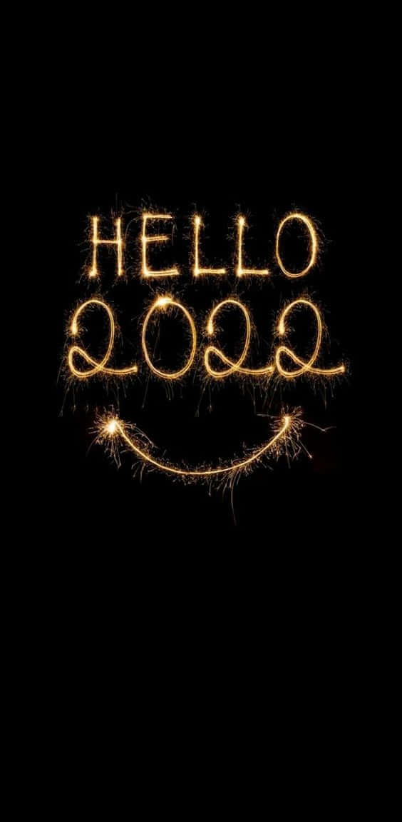 Happy New Years 桌布 壁紙 — 金色煙火字母拼出「HELLO 2022」，附帶笑臉，背景為黑色。