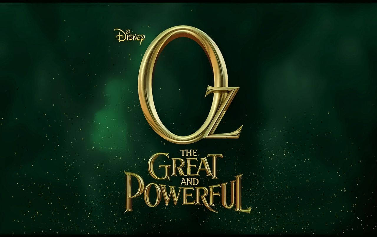 Powerful 桌布 壁紙 — 金色的 'Oz' 標題與 'The Great and Powerful' 文字在深綠色星空背景上發光。