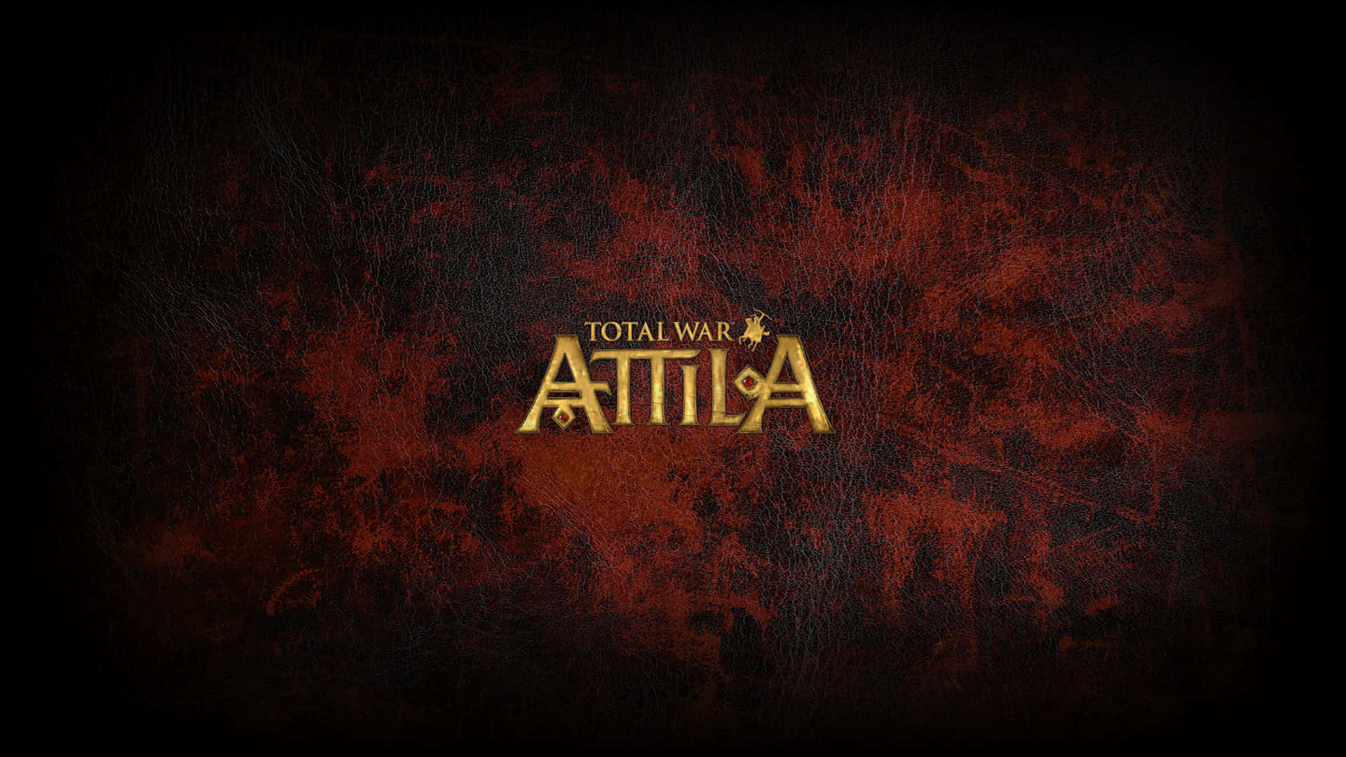 HD Total War Attila 桌布 壁紙 — 金色的 'Total War ATTILA' 標誌在深色紋理紅色皮革背景上閃耀，帶有微妙的刮痕和磨損。