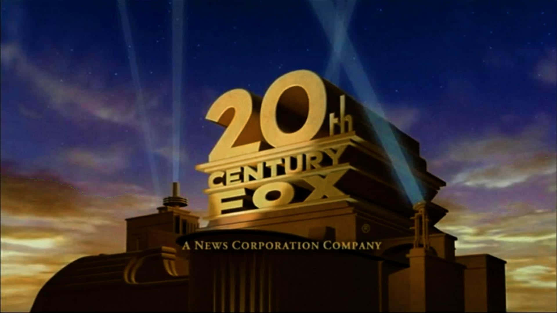 標誌 桌布 壁紙 — 金色的20th Century Fox標誌在聚光燈照射下，映襯著繁星和雲朵的暮色天空。