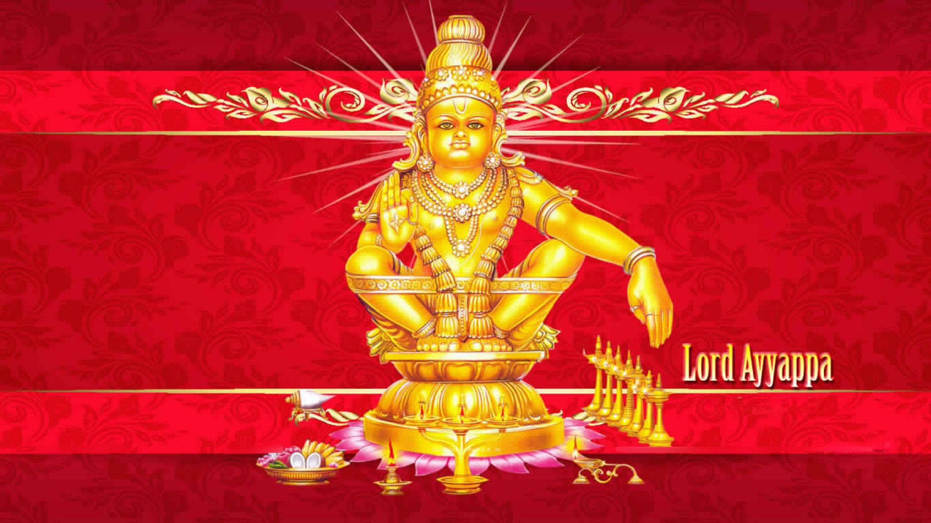 Ayyappan 桌布 壁紙 — 金色的Lord Ayyappa雕像在華麗的紅色錦緞背景上散發出神聖光芒，配以華麗的金色裝飾和祭品。