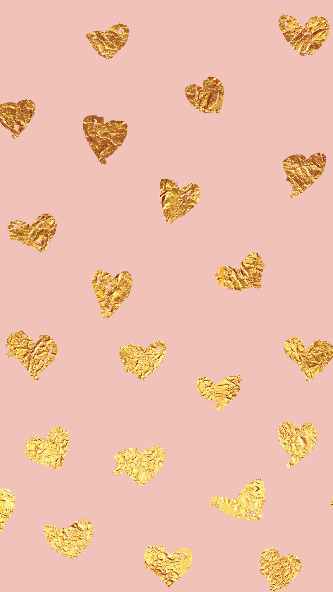 Foil 桌布 壁紙 — 金色皺紋心形在柔和的粉紅色背景上以分散的圖案漂浮。