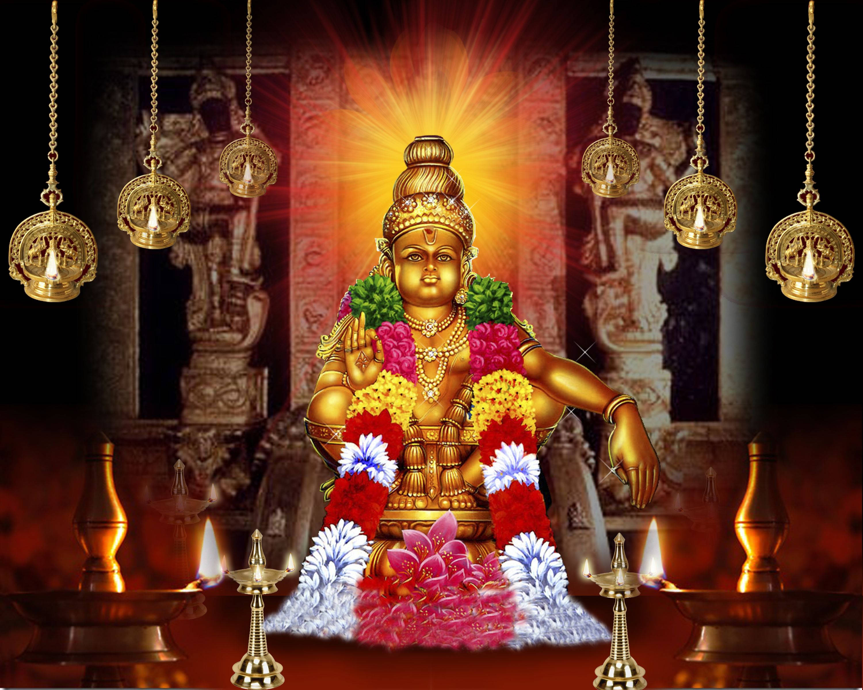 Indian 桌布 壁紙 — 金色神祇散發神聖光芒，周圍環繞著懸掛的燈籠和鮮豔的花環，在神聖的寺廟環境中。