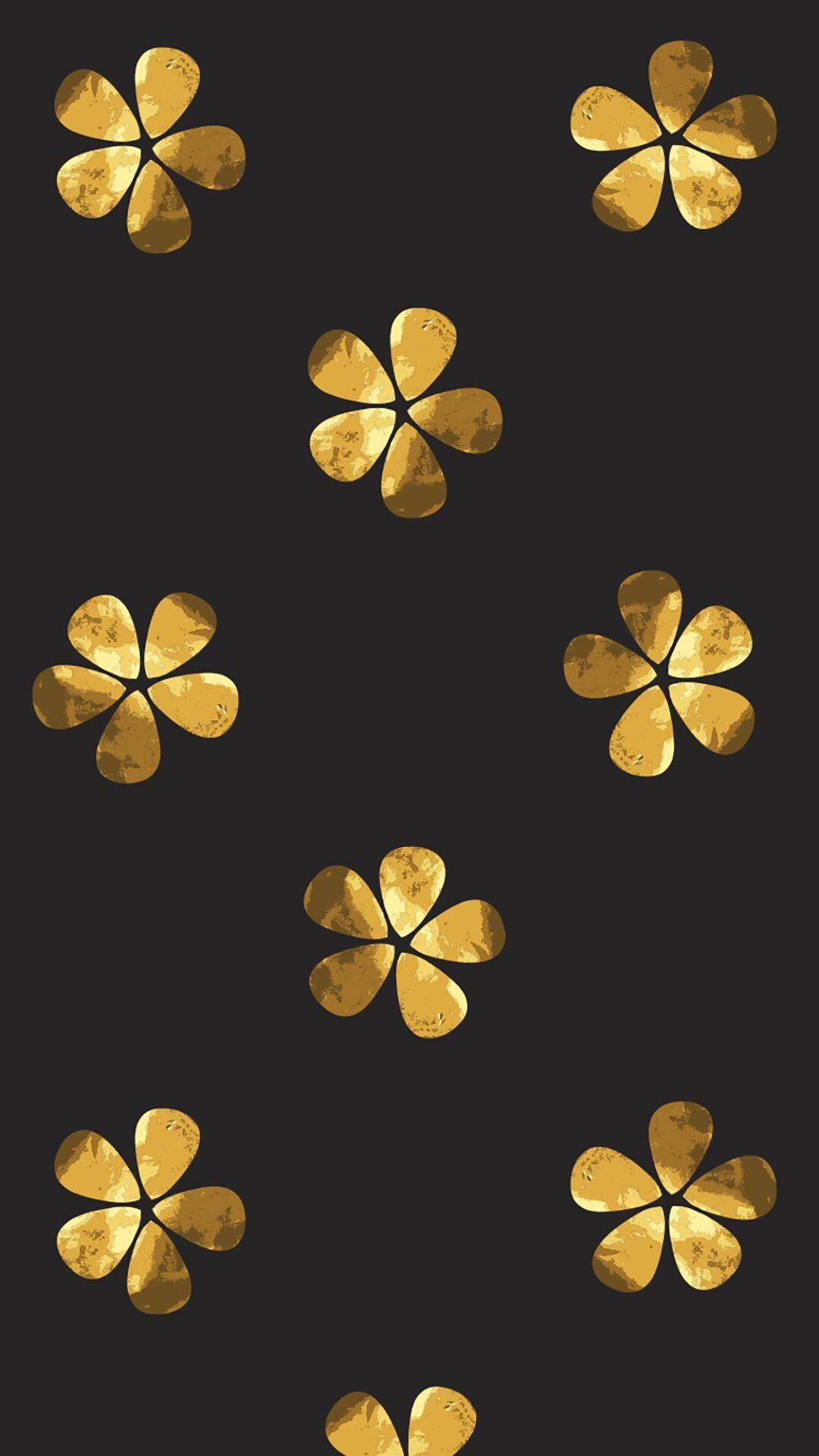 金色美學 桌布 壁紙 — 金色紋理的五瓣花朵以散落圖案漂浮在深黑色背景上。