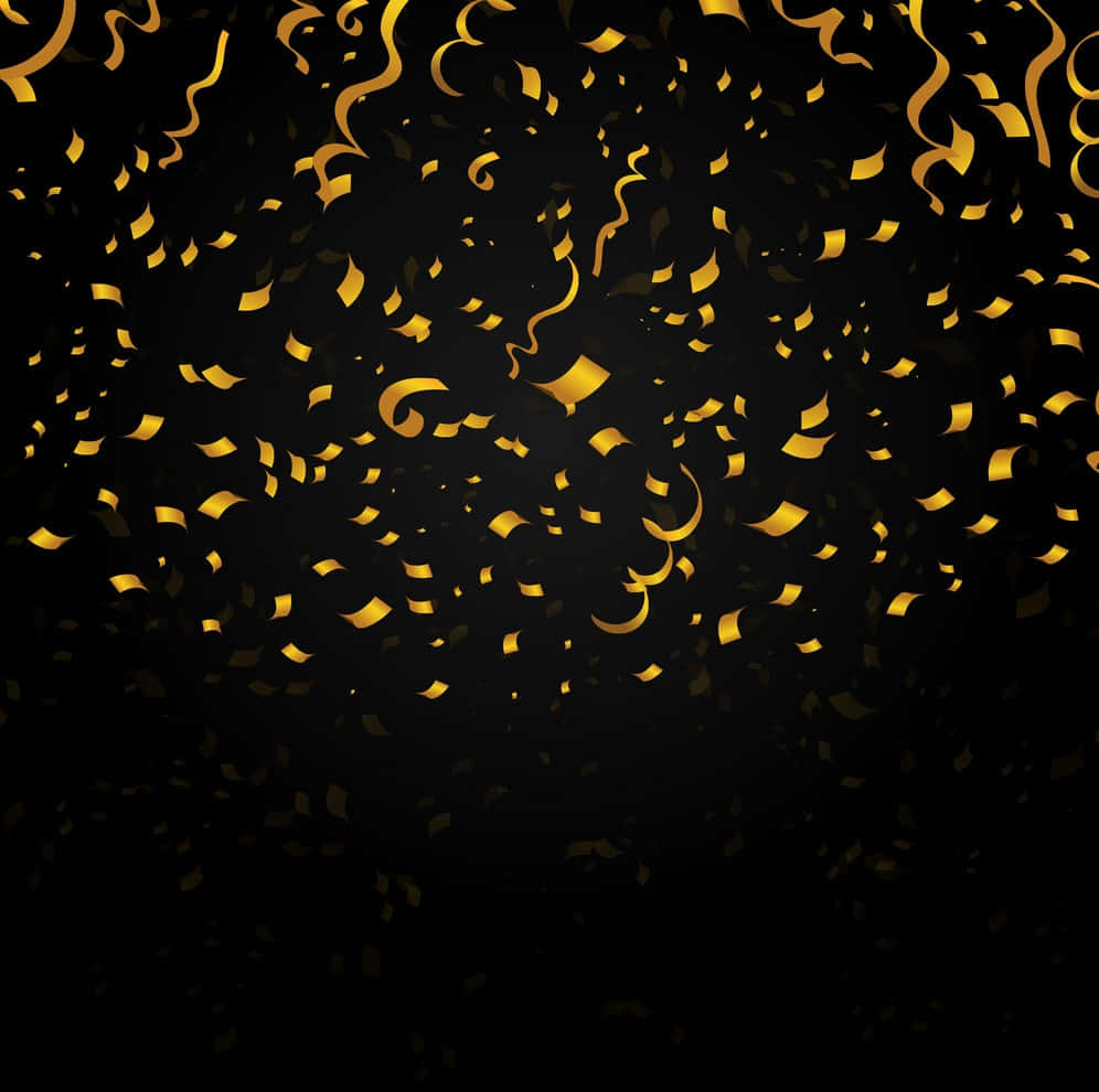 Gold Confetti 桌布 壁紙 — 金色紙碎漩渦和碎片在深黑色背景上漂浮，營造節日慶祝場景。