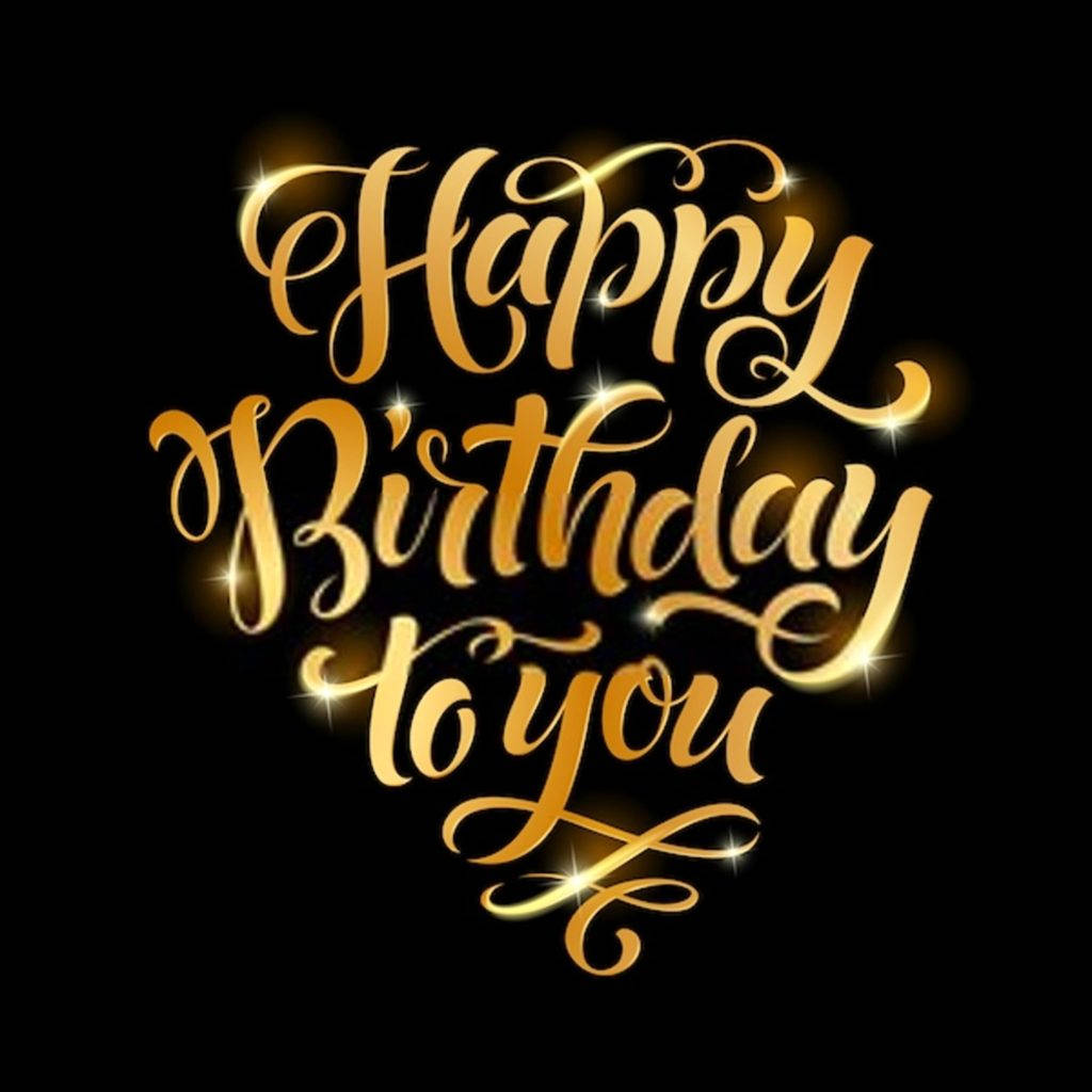 金色生日祝福文字，心形，帶閃爍亮點，黑色背景 — 生日快樂 GIF 壁紙