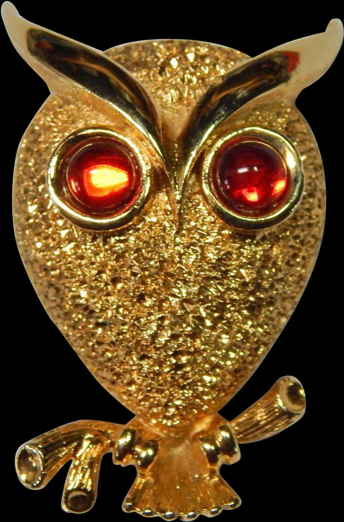 金色貓頭鷹胸針配紅寶石眼睛 壁紙