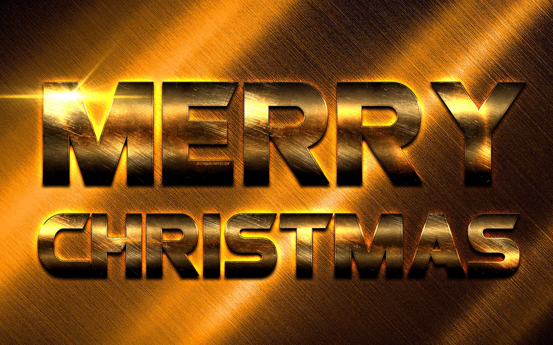 Gold Christmas 桌布 壁紙 — 金色金屬質感的「MERRY CHRISTMAS」文字在拉絲金屬背景上閃耀著明亮的光芒。