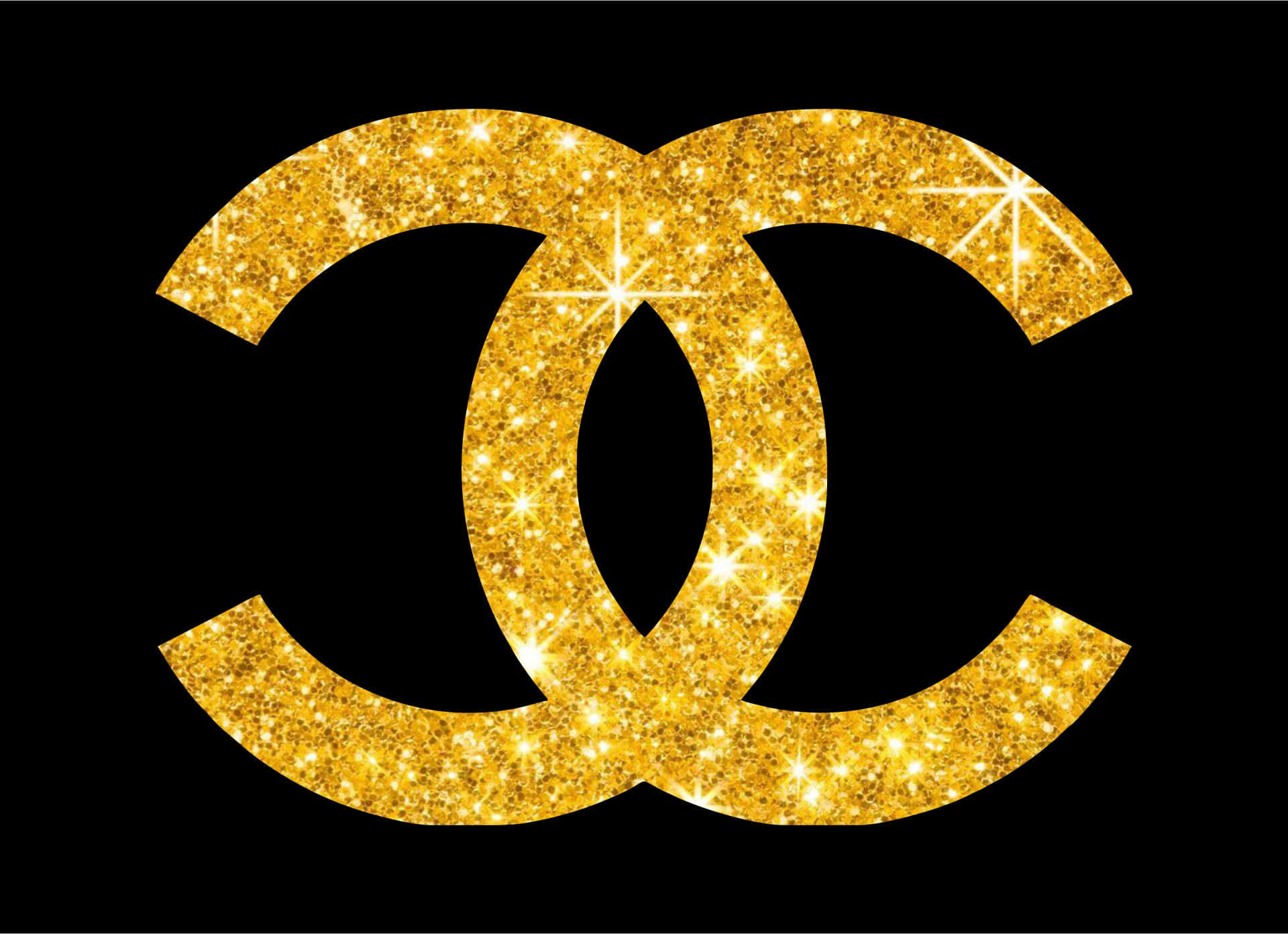 Chanel 桌布 壁紙 — 金色閃粉 Chanel 標誌，搭配閃爍星星，置於純黑色背景上。