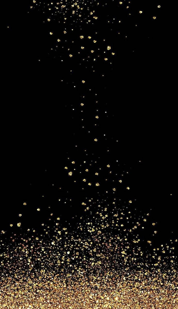 Gold Glitter 桌布 壁紙 — 金色閃粉粒子在純黑色背景上垂直傾瀉而下，營造出奢華閃爍的效果。