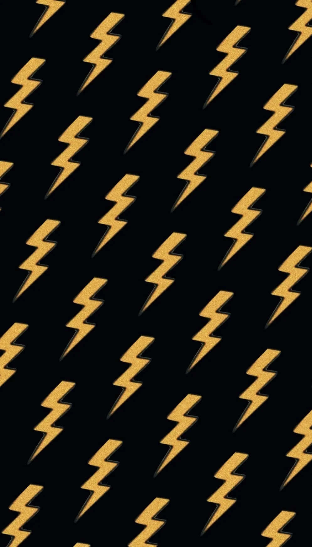 Lightning Bolt 桌布 壁紙 — 金色閃電在純黑色背景上以對角線重複，形成大膽的圖案。