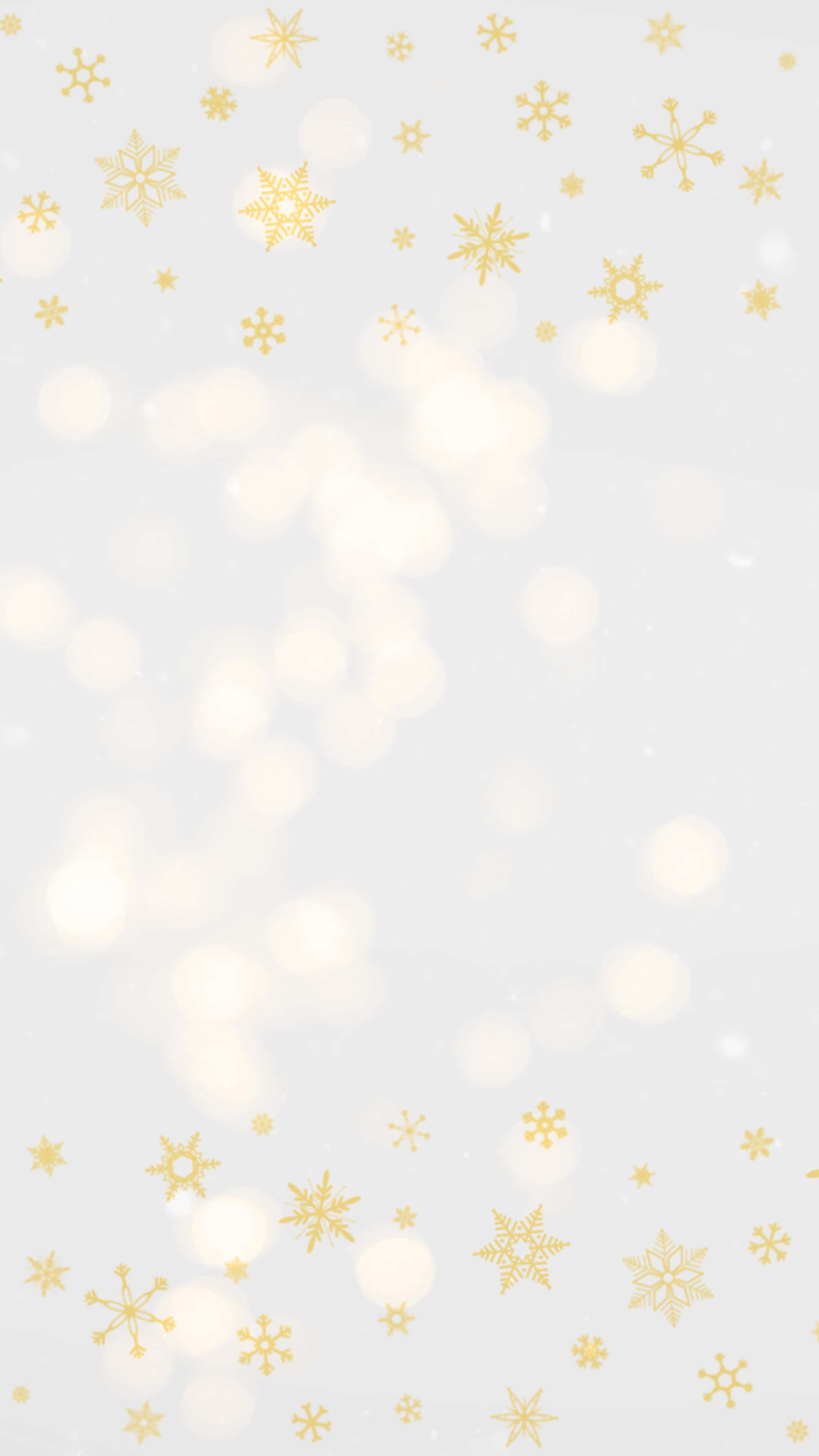 聖誕節 桌布 壁紙 — 金色雪花在柔和白色背景上伴隨發光散景燈光輕輕飄落。