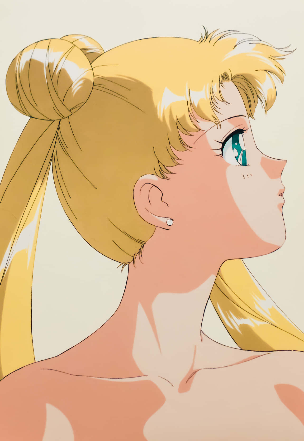 金色馬尾辮和青綠色眼睛的動漫女孩向上看。 — 美少女戰士 GIF 壁紙