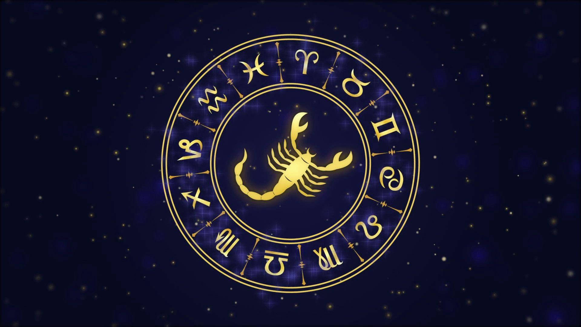 黃道輪，金色天蠍座符號被星座環繞，在深藍色星空背景上。 — 星座 GIF 壁紙
