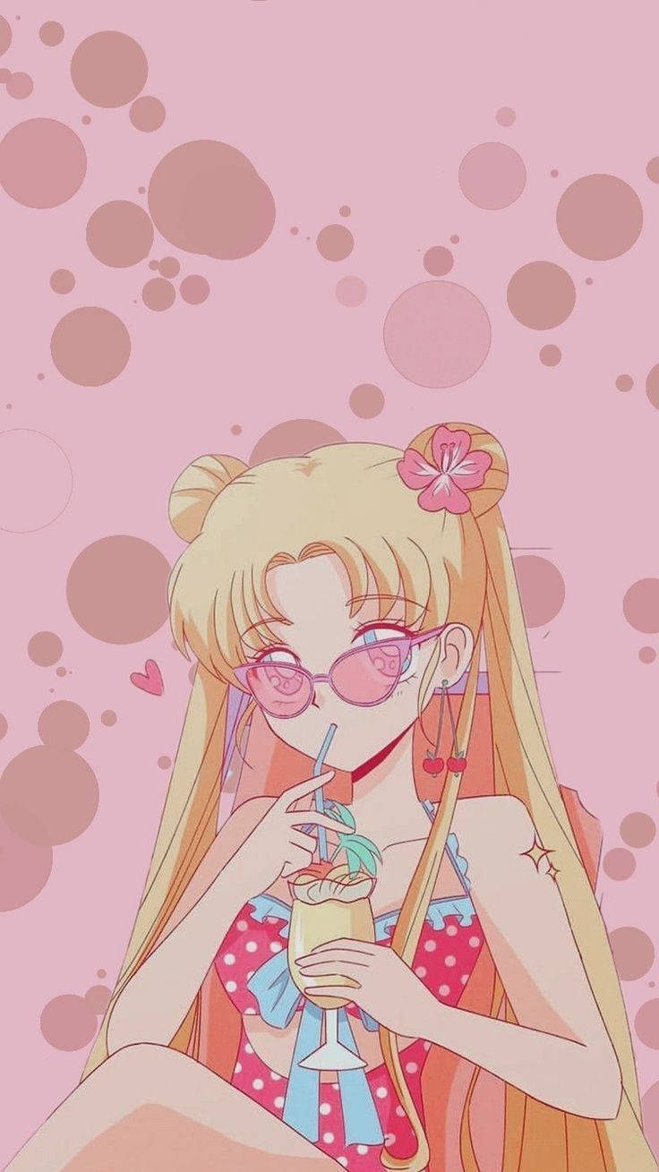 戴著粉紅色太陽眼鏡的動漫女孩，正在啜飲飾有櫻桃的飲料。 — 美少女戰士 GIF 壁紙