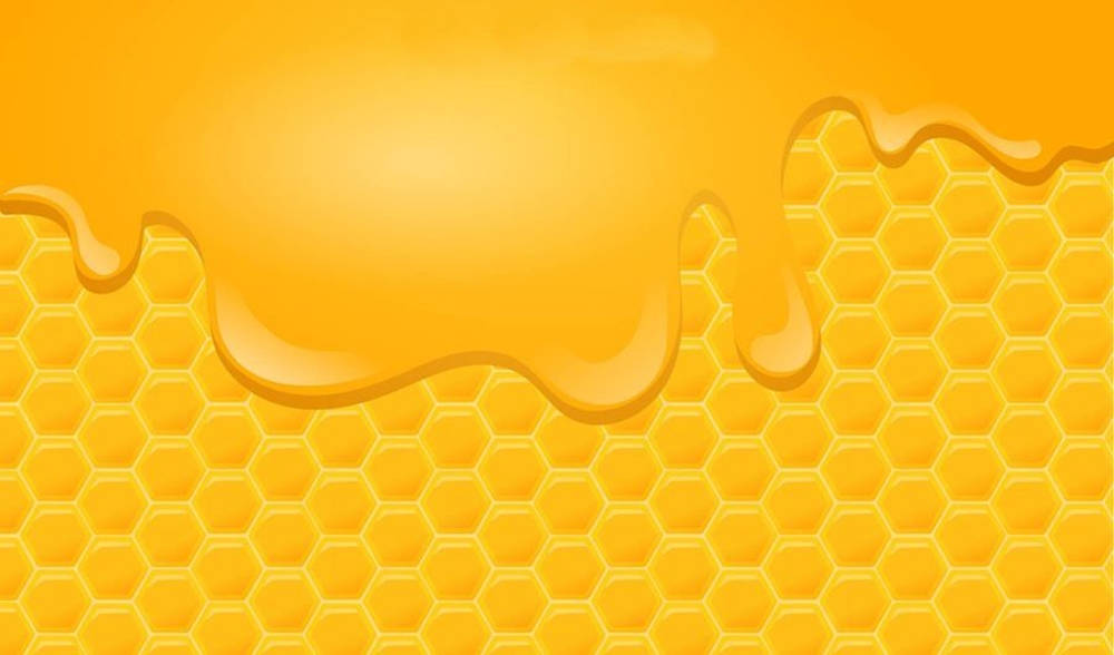 Bee 桌布 壁紙 — 金黃色的蜂蜜滴落在帶有紋理的蜂巢上，呈現溫暖而光芒四射的漸變效果。