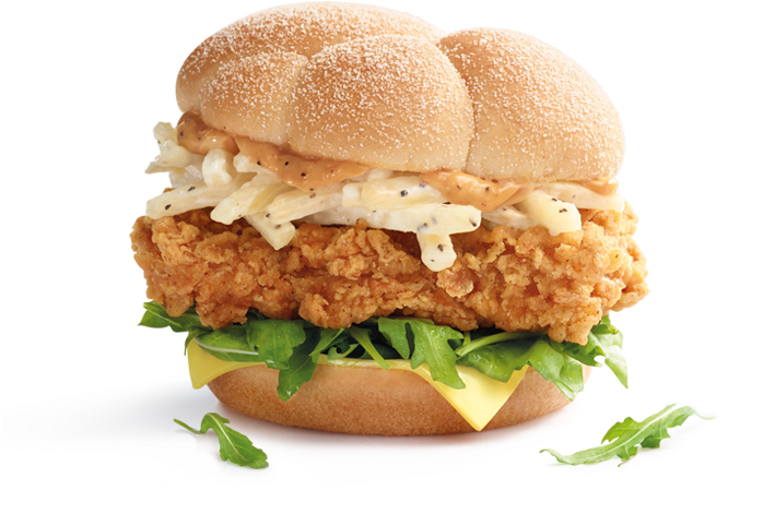 麥當勞 桌布 壁紙 — 金黃酥脆炸雞三明治，配上奶油醬、芝麻葉和起司，放在芝麻麵包上。