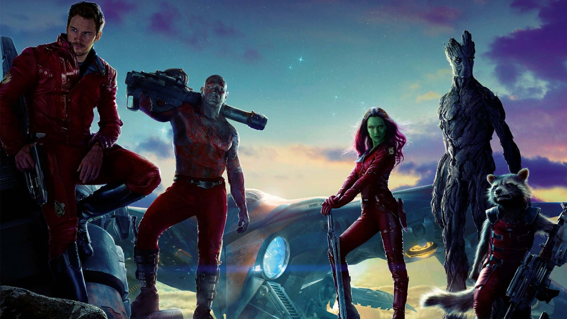 Marvel Movie 桌布 壁紙 — 銀河守護者英雄式地站在太空船上，背景是充滿星星的鮮豔暮色天空。