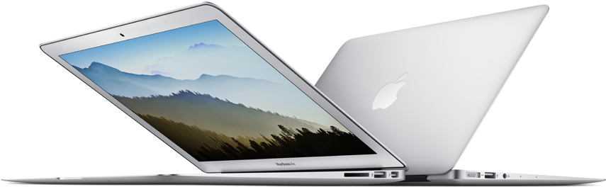 筆電 桌布 壁紙 — 銀色 MacBook 筆記型電腦打開，顯示一個霧氣瀰漫的山景桌布，背景為黑色。
