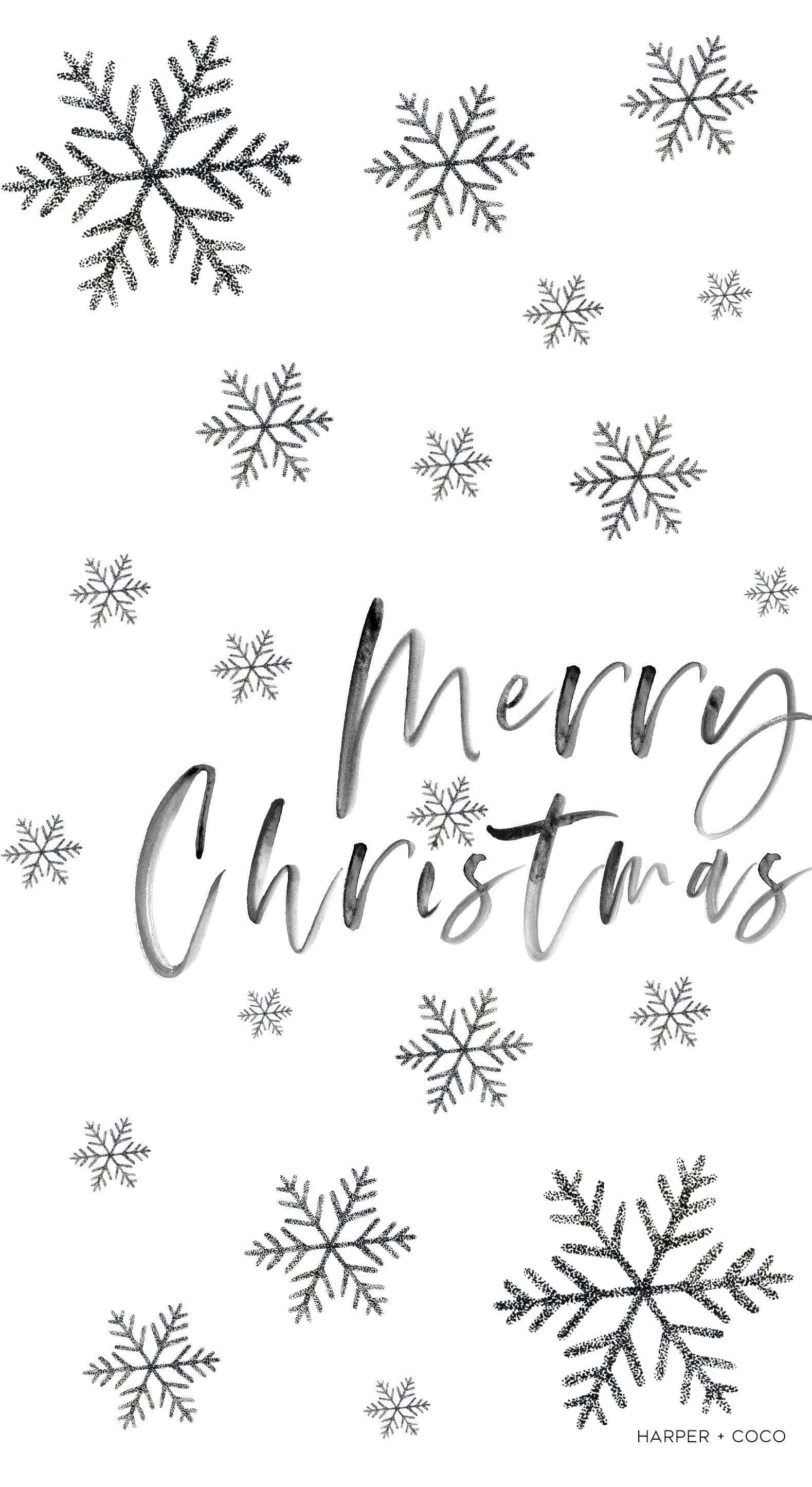 White Texture 桌布 壁紙 — 銀色閃粉雪花漂浮在優雅草書Merry Christmas文字周圍，背景為純白。