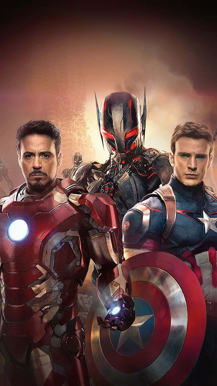 Avengers Movie 桌布 壁紙 — 鋼鐵人、美國隊長和蟻人穿著發光盔甲和盾牌，英勇地站在熾熱的戰場上。