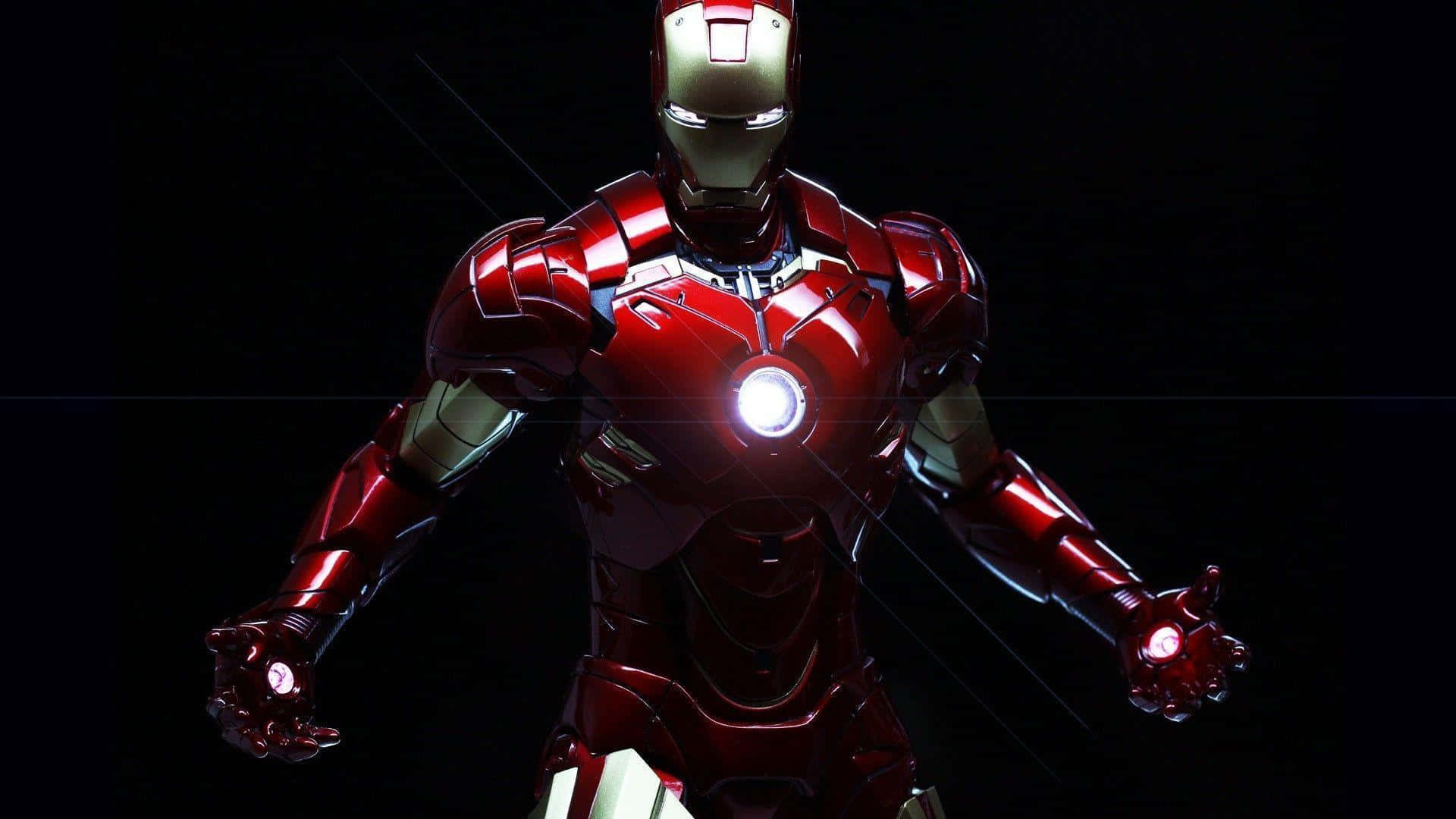 Iron Man Suit 桌布 壁紙 — 鋼鐵人以其標誌性的紅色和金色裝甲，在黑色背景上擺出姿勢，裝甲帶有發光的斥力炮。