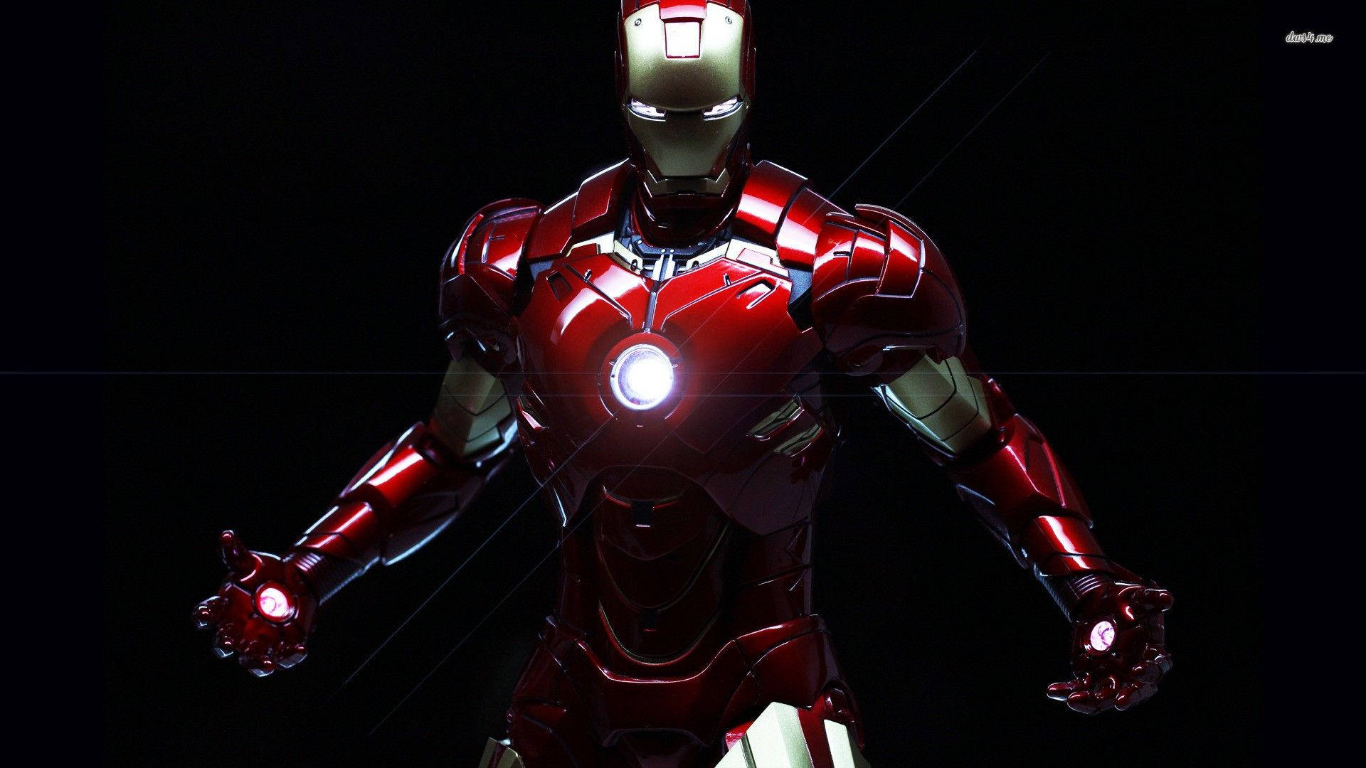 Iron Man Mark 3 桌布 壁紙 — 鋼鐵人以標誌性的紅金戰甲，在黑暗背景中亮起斥力光，蓄勢待發。