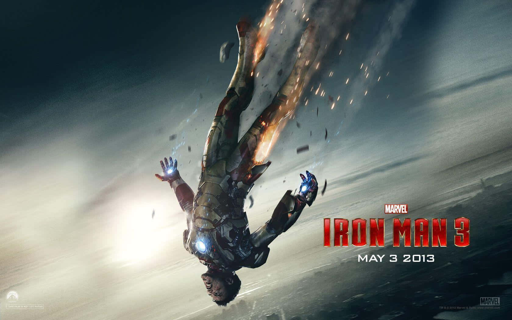 Iron Man Movies 桌布 壁紙 — 鋼鐵人在暴風雨中墜落，他的戰衣在明亮的陽光爆發中化為熾熱的火花而解體。