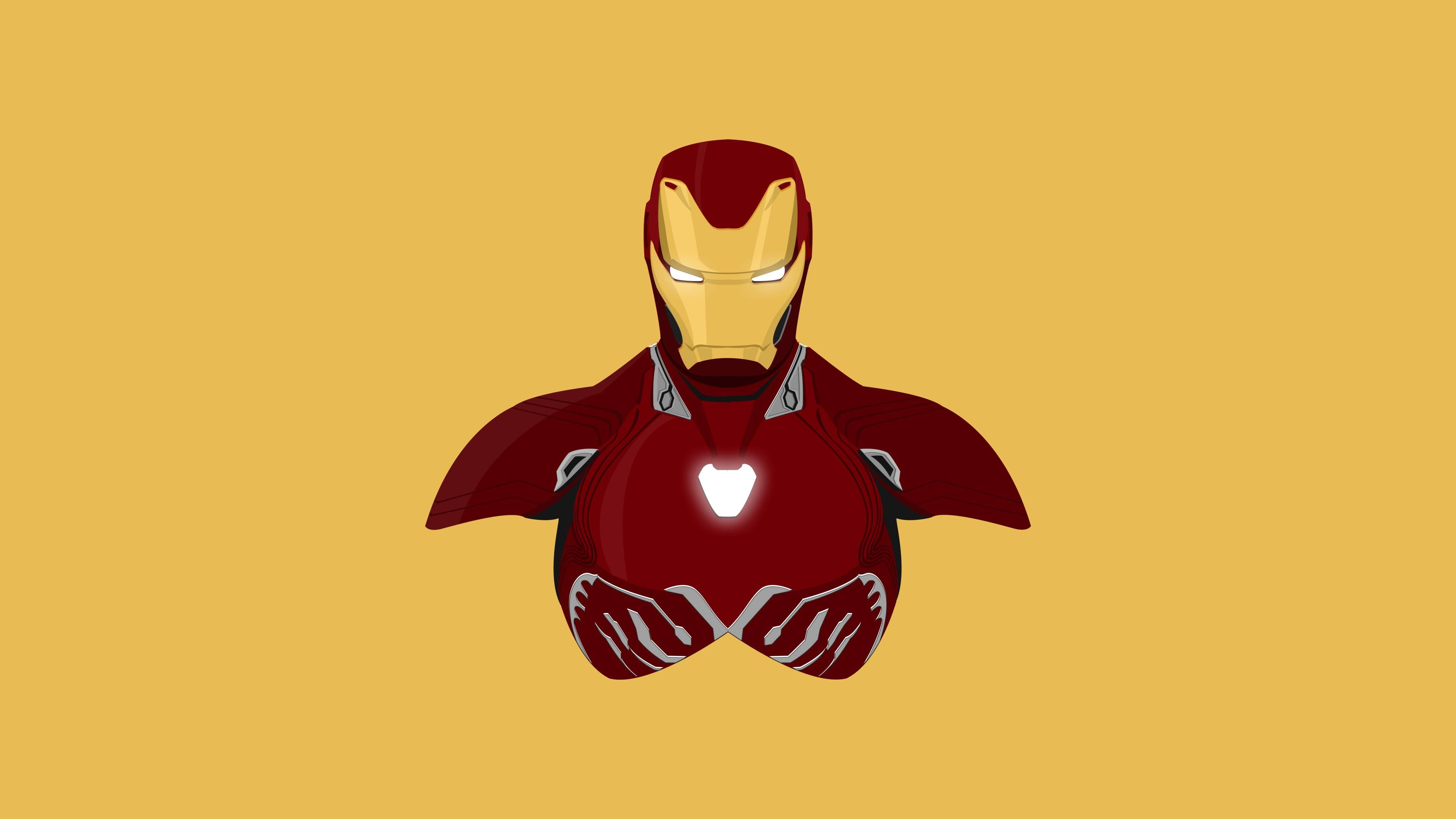 Iron Man Logo 桌布 壁紙 — 鋼鐵人標誌性的紅色和金色裝甲軀幹在純芥末黃色背景上發光。