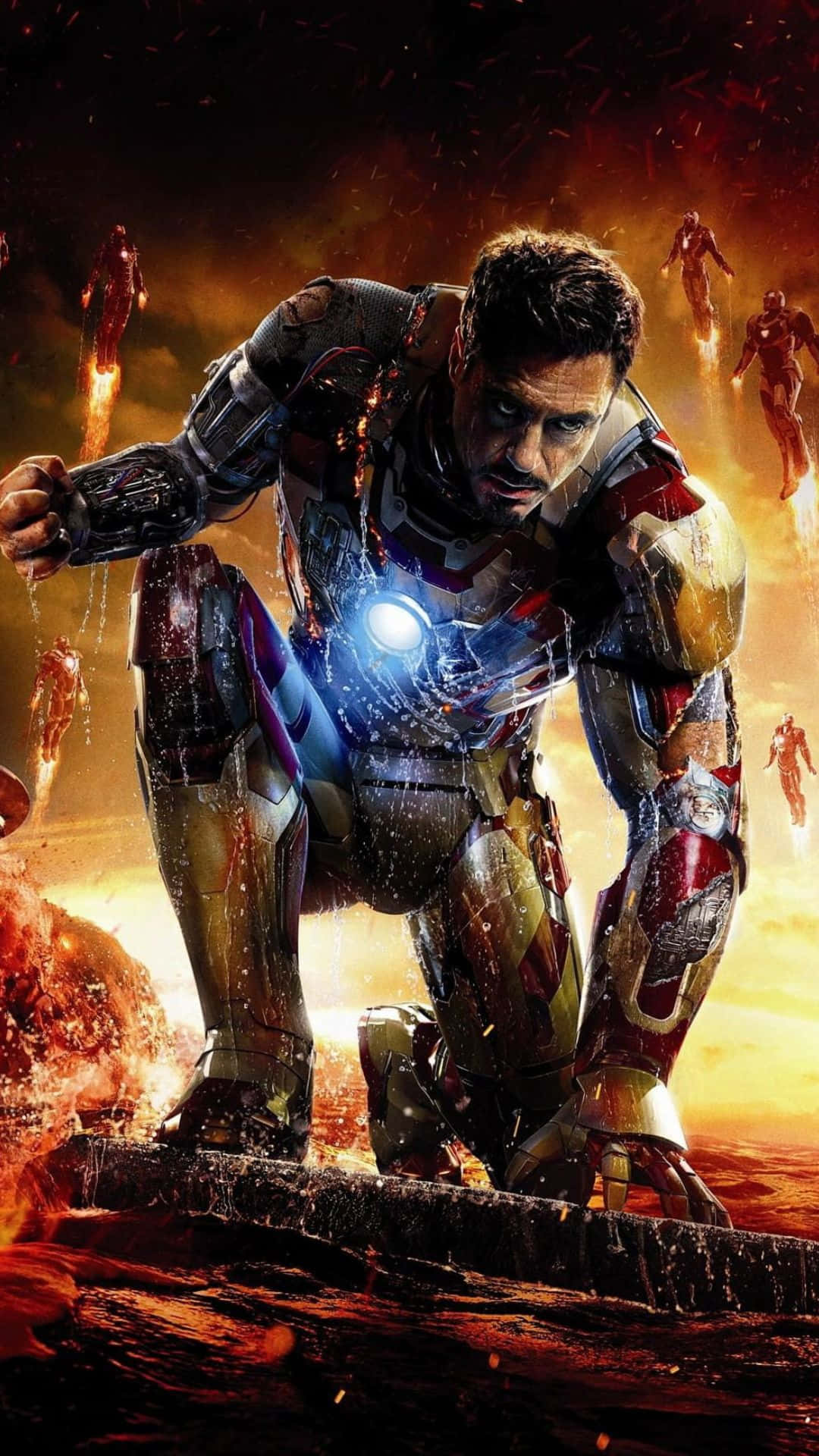 Android Iron Man 桌布 壁紙 — 鋼鐵人穿著戰鬥裝甲蹲在熾熱爆炸中，其他戰衣在他身後飛翔。