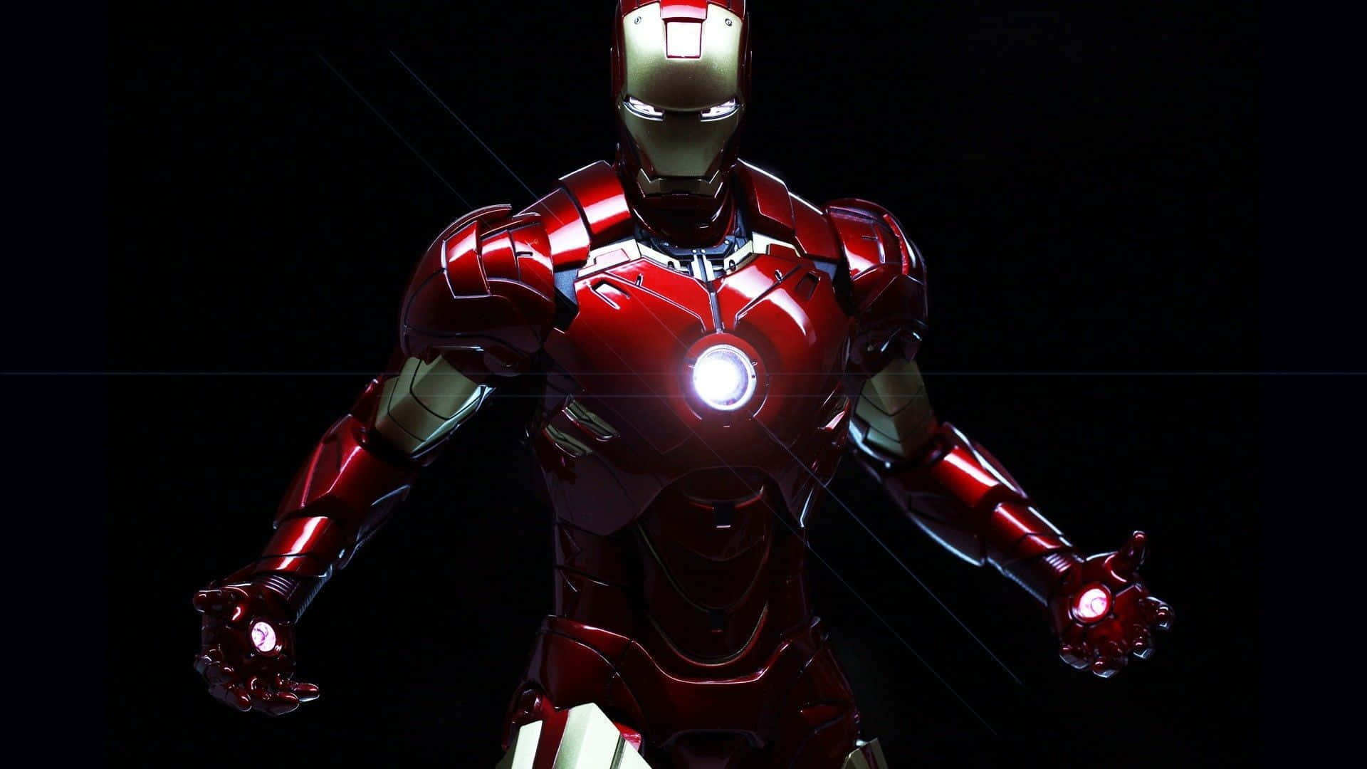Iron Man Action Figures 桌布 壁紙 — 鋼鐵人穿著標誌性的紅色和金色盔甲，在黑色背景前蓄勢待發，雙手發射器閃耀光芒。