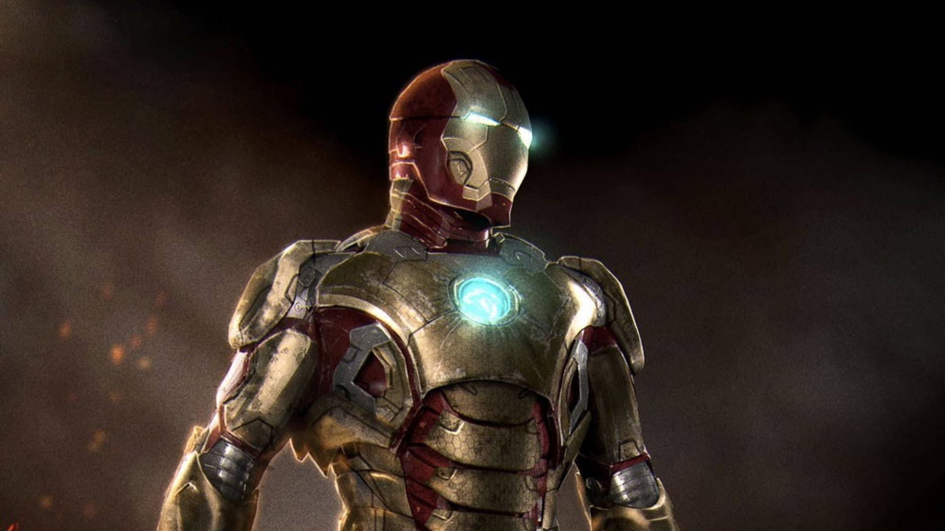 Iron Man Mark 3 桌布 壁紙 — 鋼鐵人站在黑暗煙霧瀰漫的環境中，他發光的弧形反應爐和頭盔燈照亮了場景。