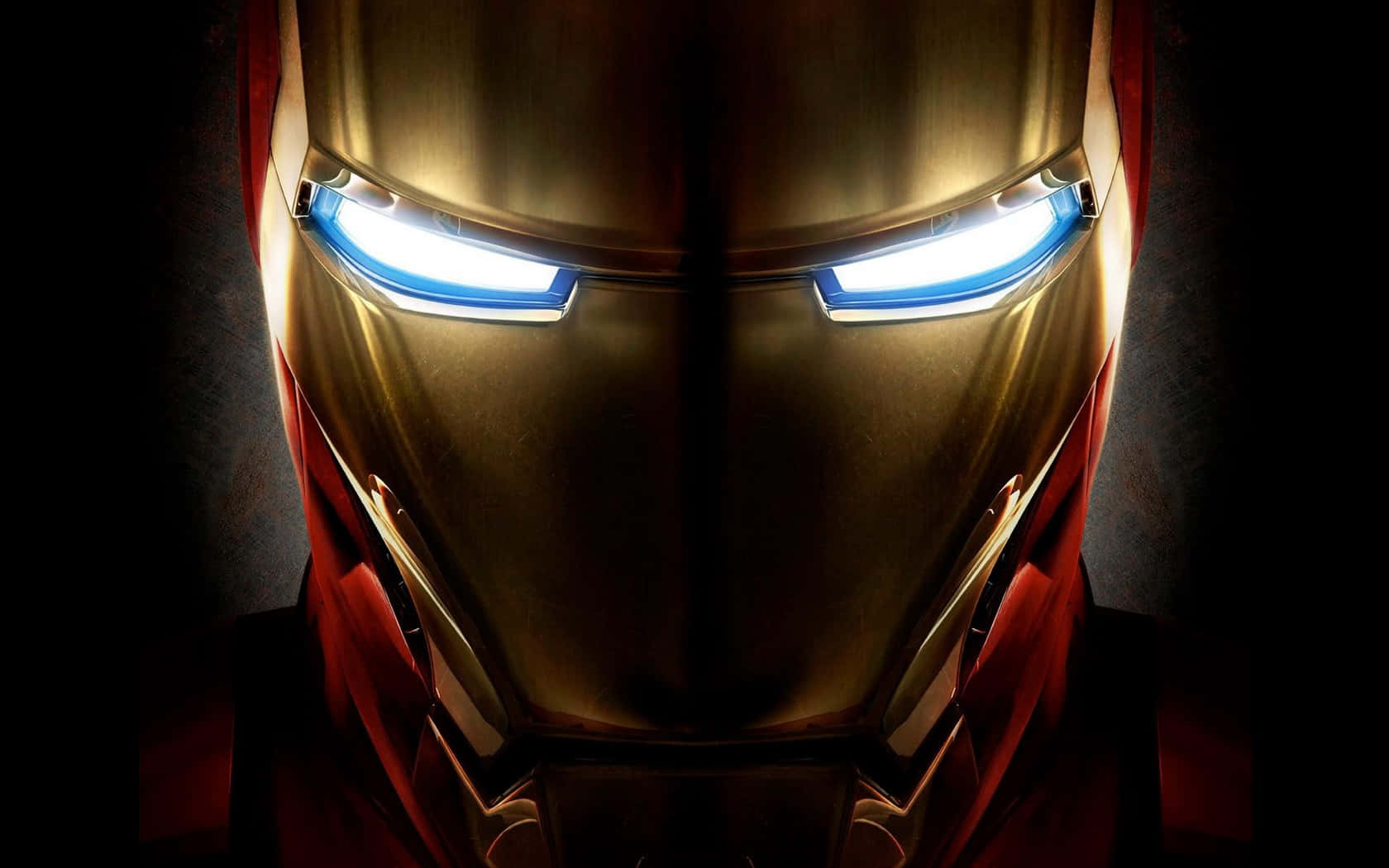 Best Iron Man 桌布 壁紙 — 鋼鐵人頭盔特寫，藍色眼睛在黑暗背景中發光。