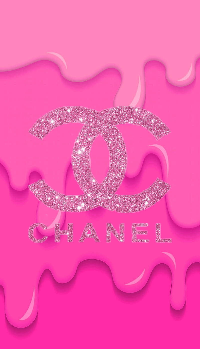 Pink Chanel Logo 桌布 壁紙 — 閃亮的粉紅色Chanel標誌像液體糖果一樣滴在充滿活力的粉紅色背景上。